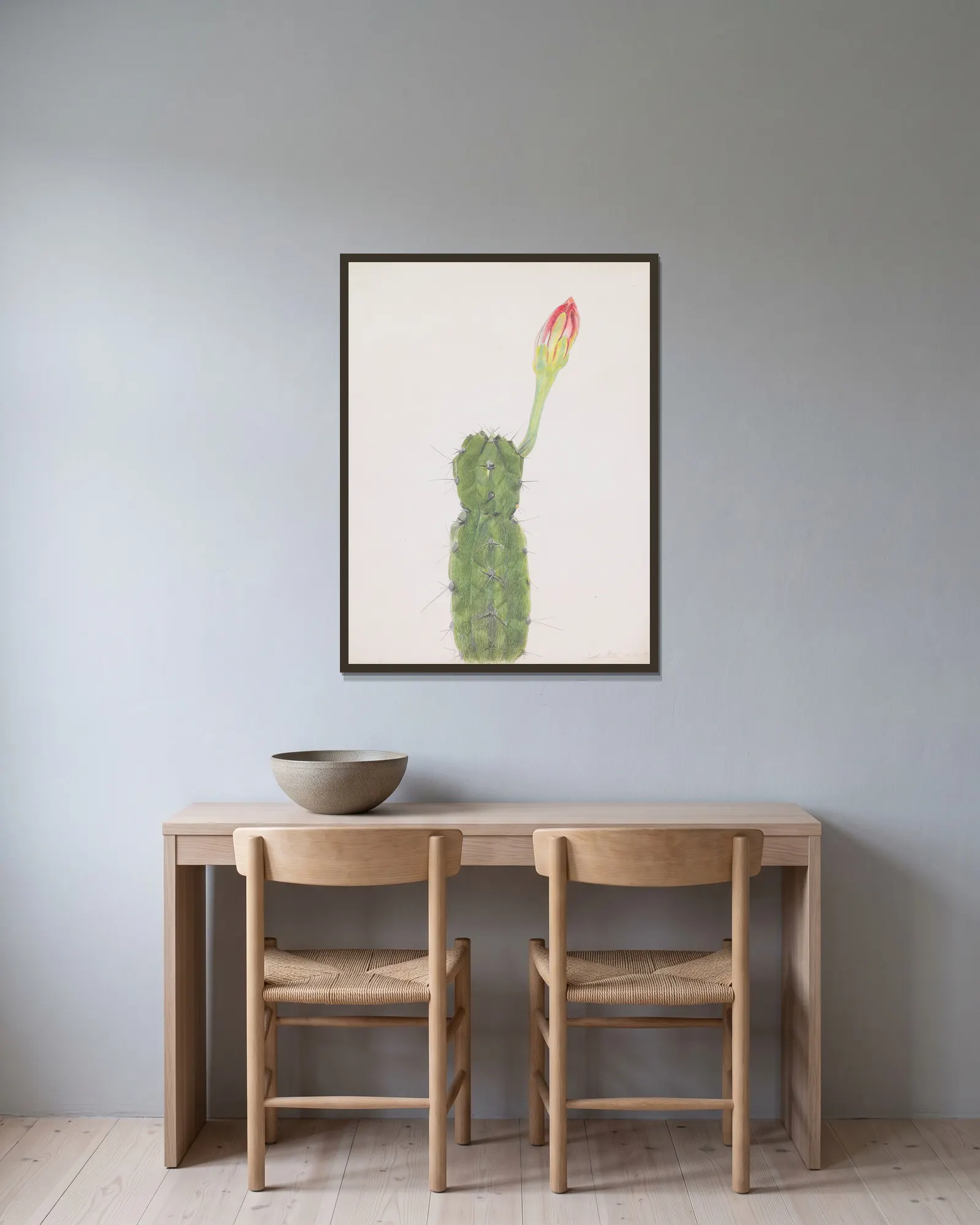 Cactus av Joseph Stella inramad på en vägg