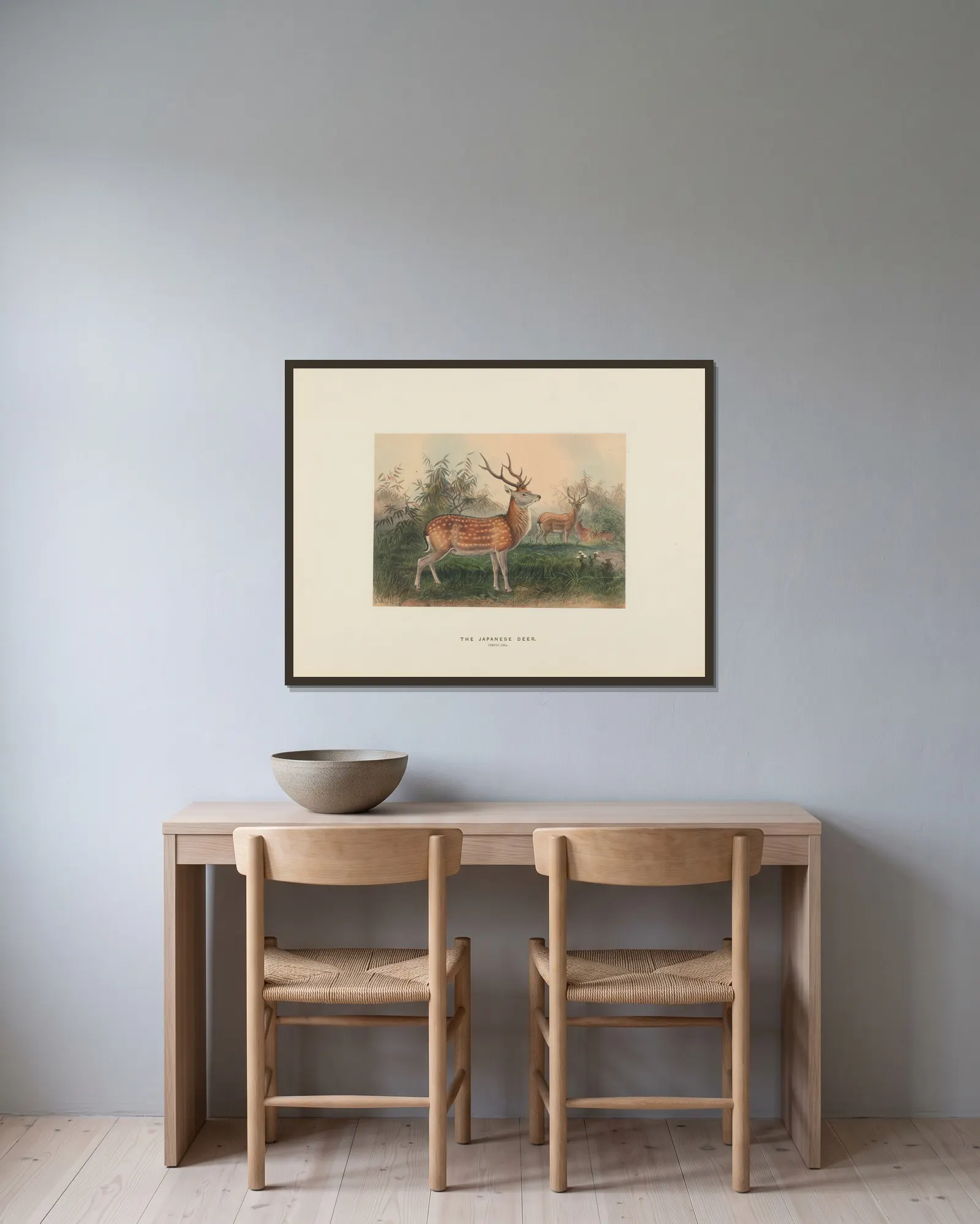 The Japanese Deer av Joseph Wolf inramad på en vägg