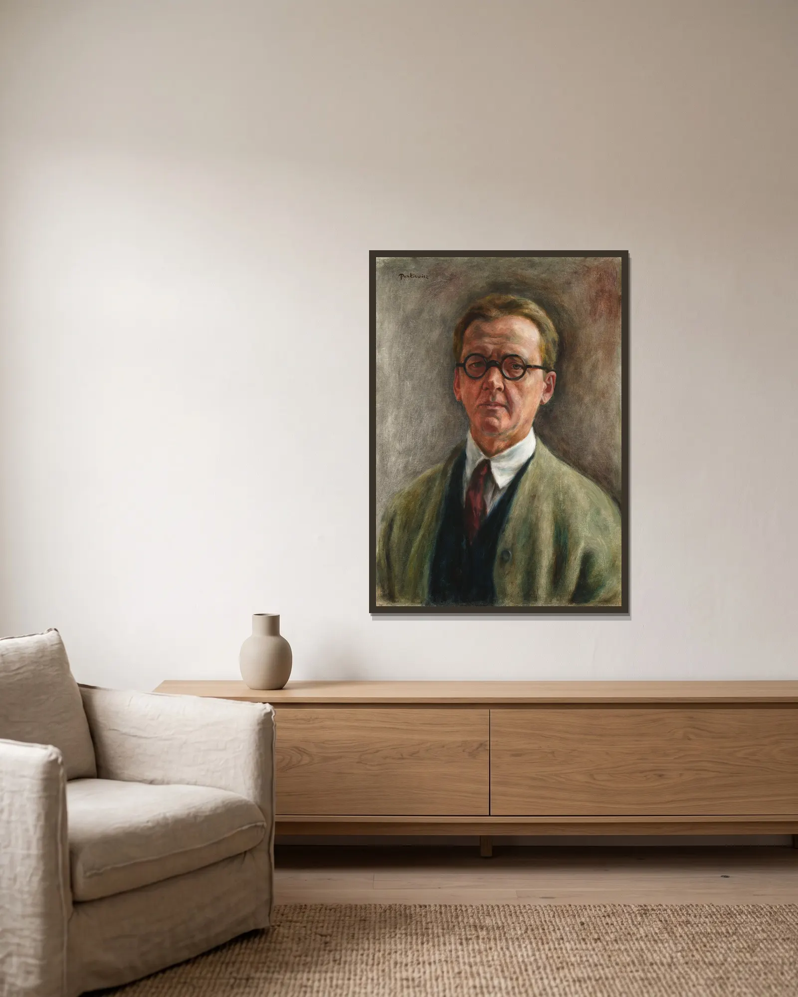 Self-portrait av Józef Pankiewicz inramad på en vägg