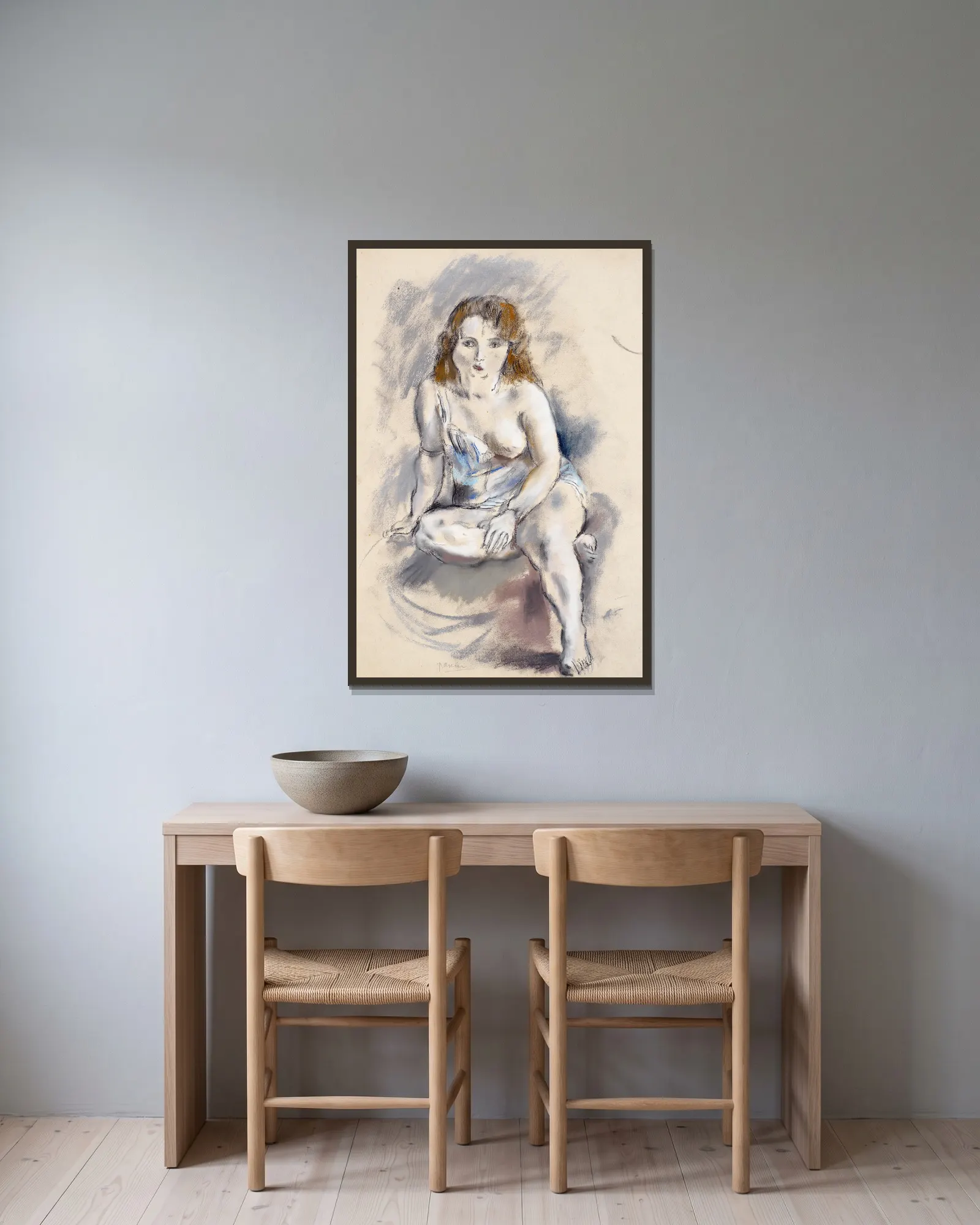 Nude av Jules Pascin inramad på en vägg