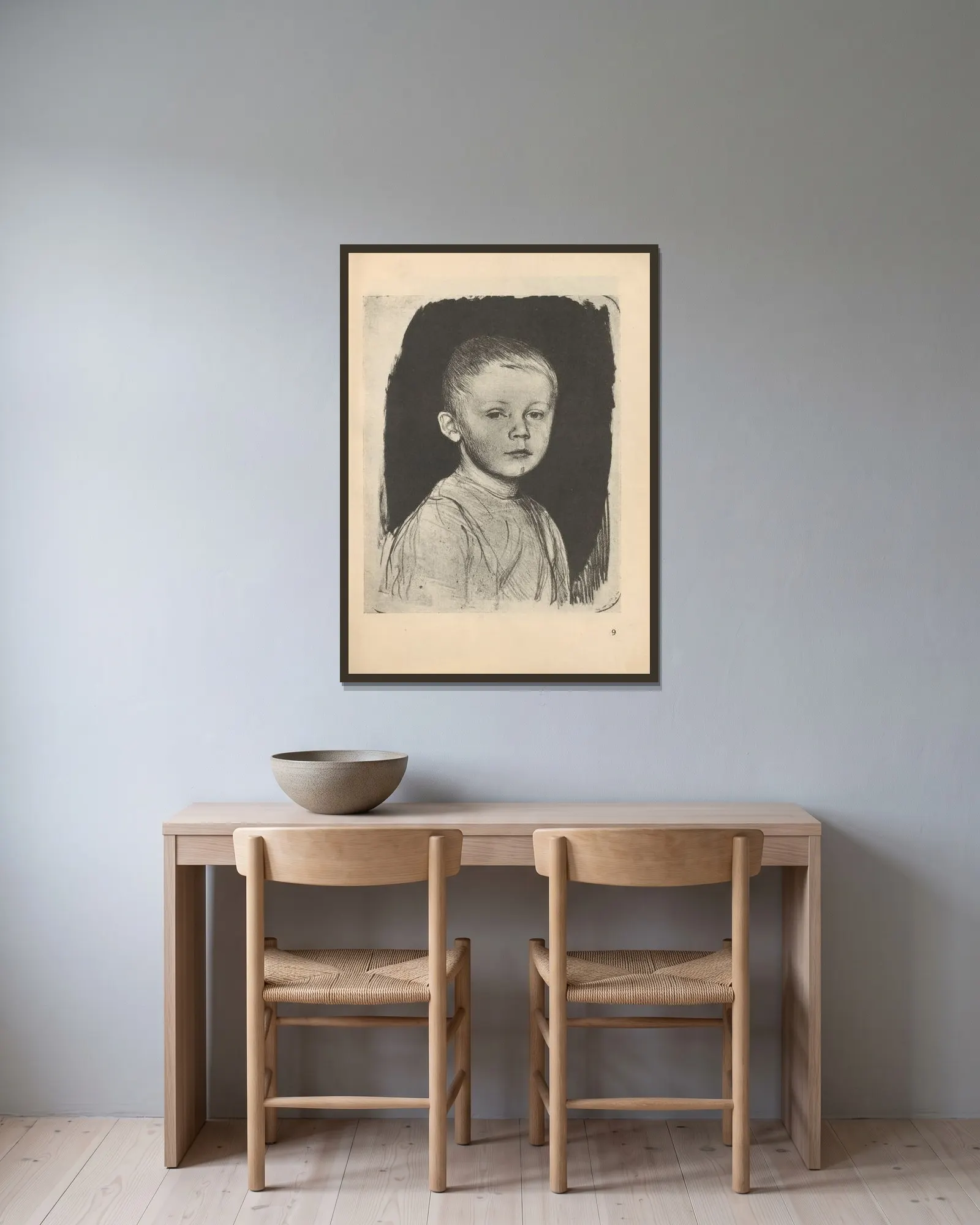 Hans Kollwitz av Käthe Kollwitz inramad på en vägg