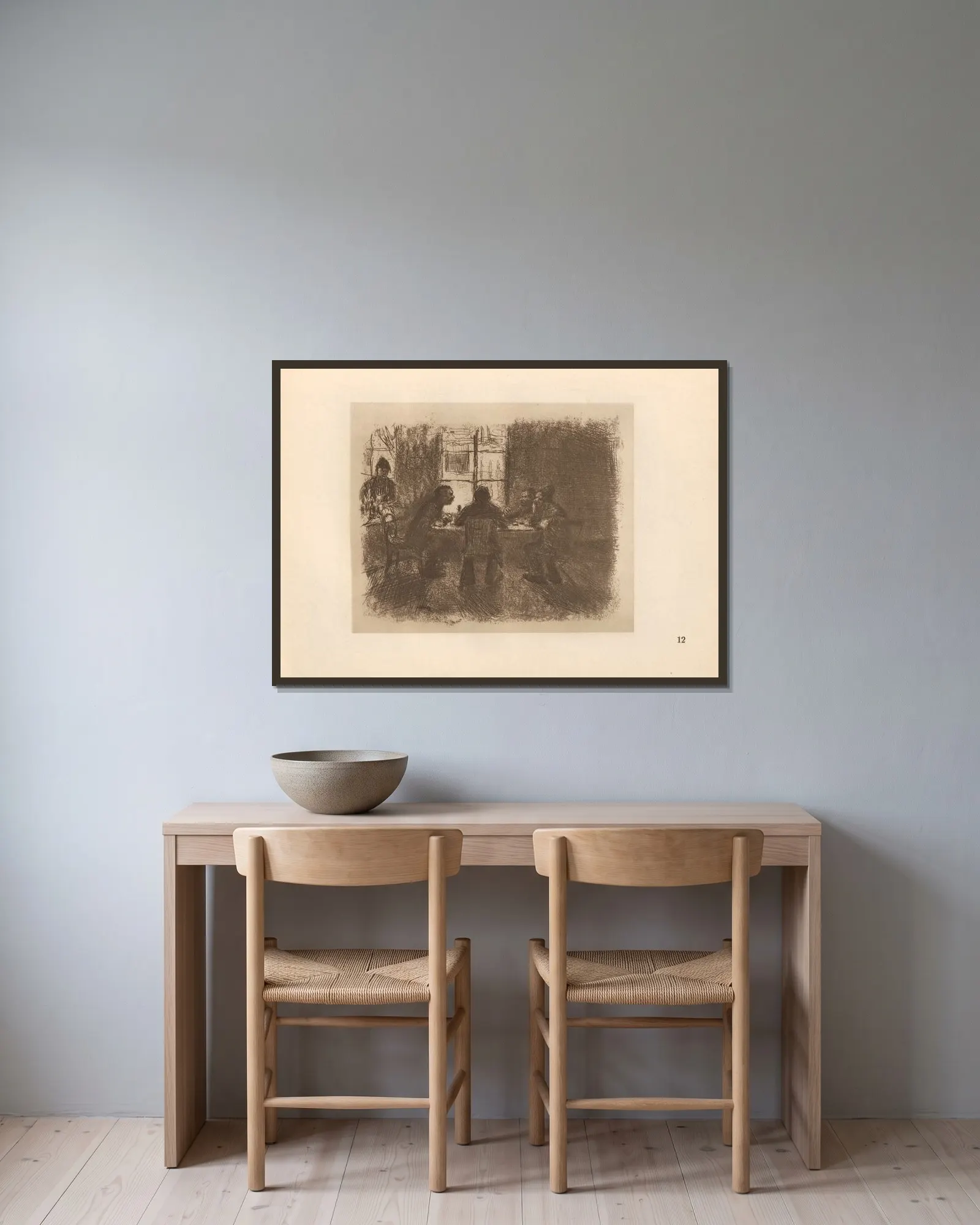 Kneipe av Käthe Kollwitz inramad på en vägg