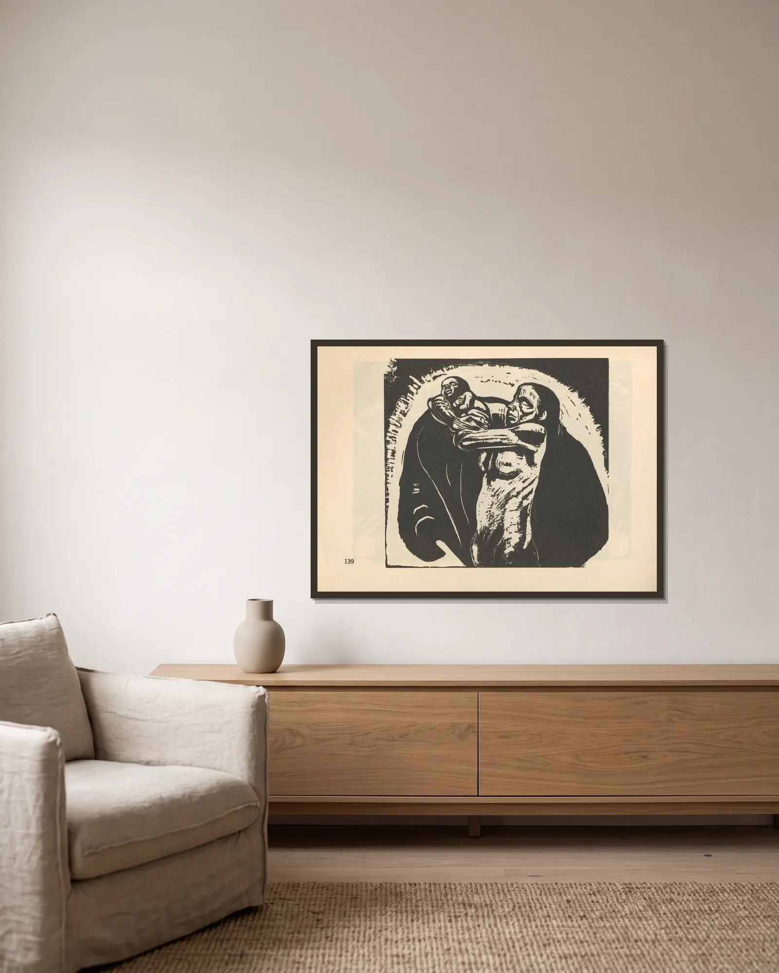 Krieg av Käthe Kollwitz inramad på en vägg