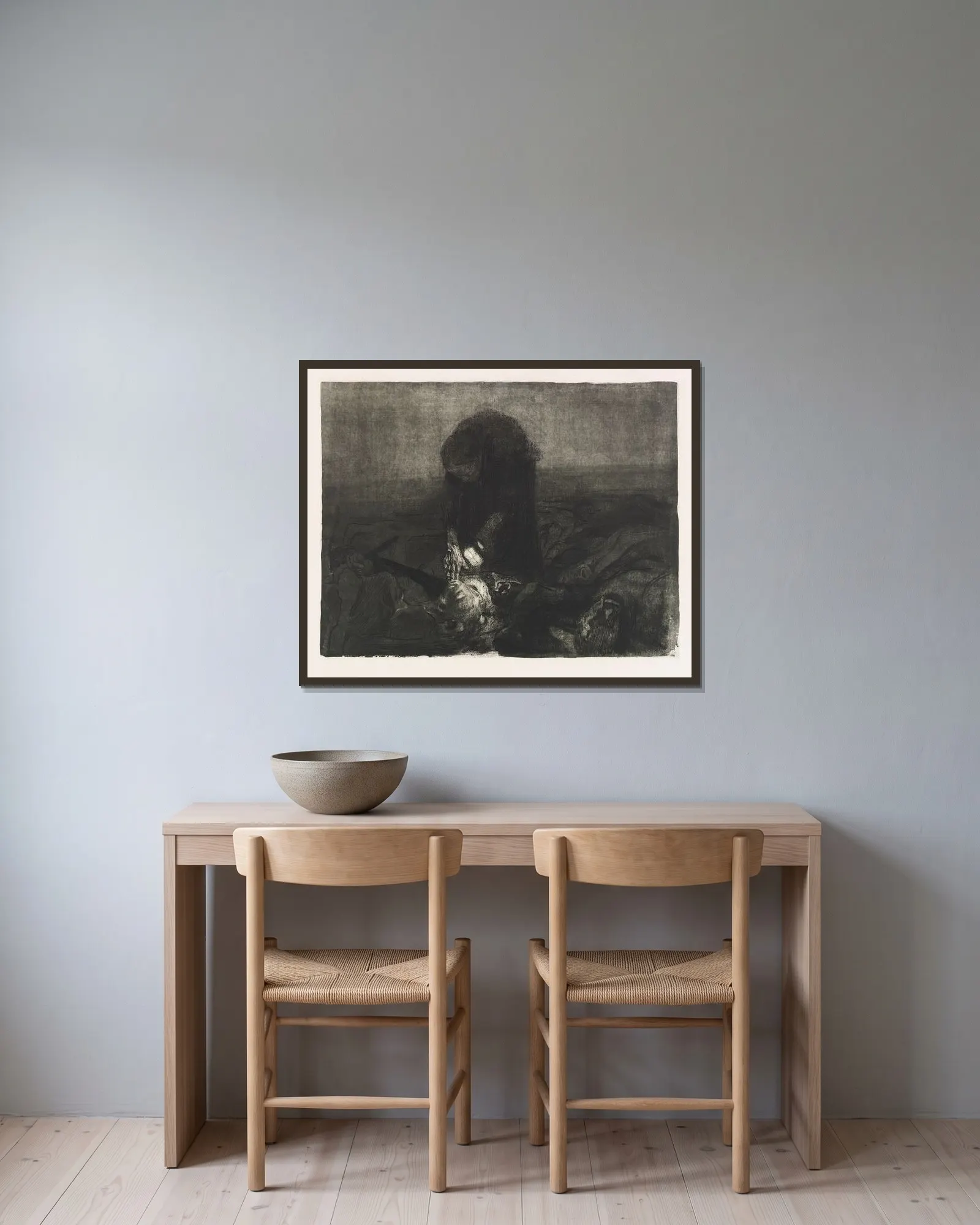 Schlachtfeld av Käthe Kollwitz inramad på en vägg