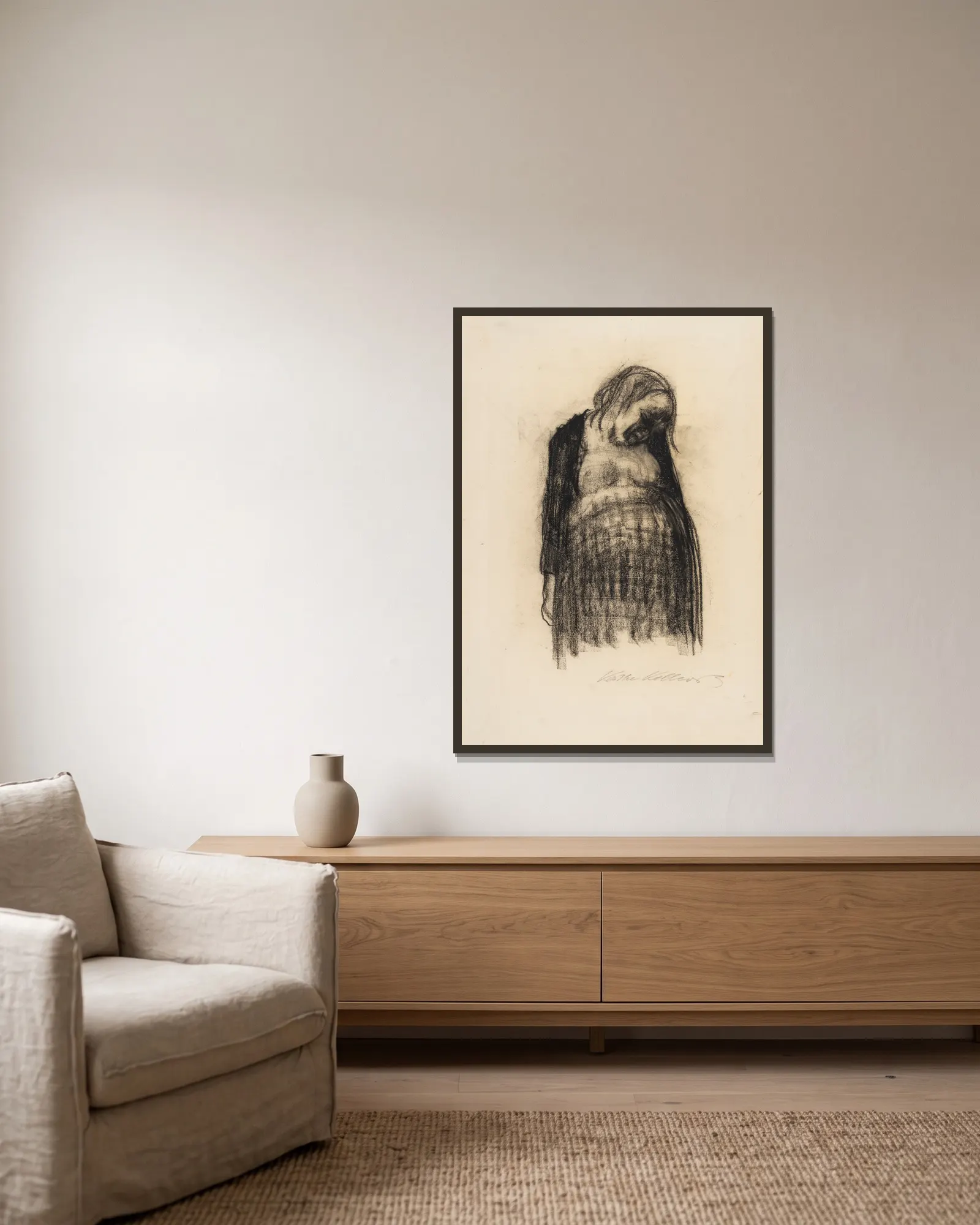 Schwangere av Käthe Kollwitz inramad på en vägg