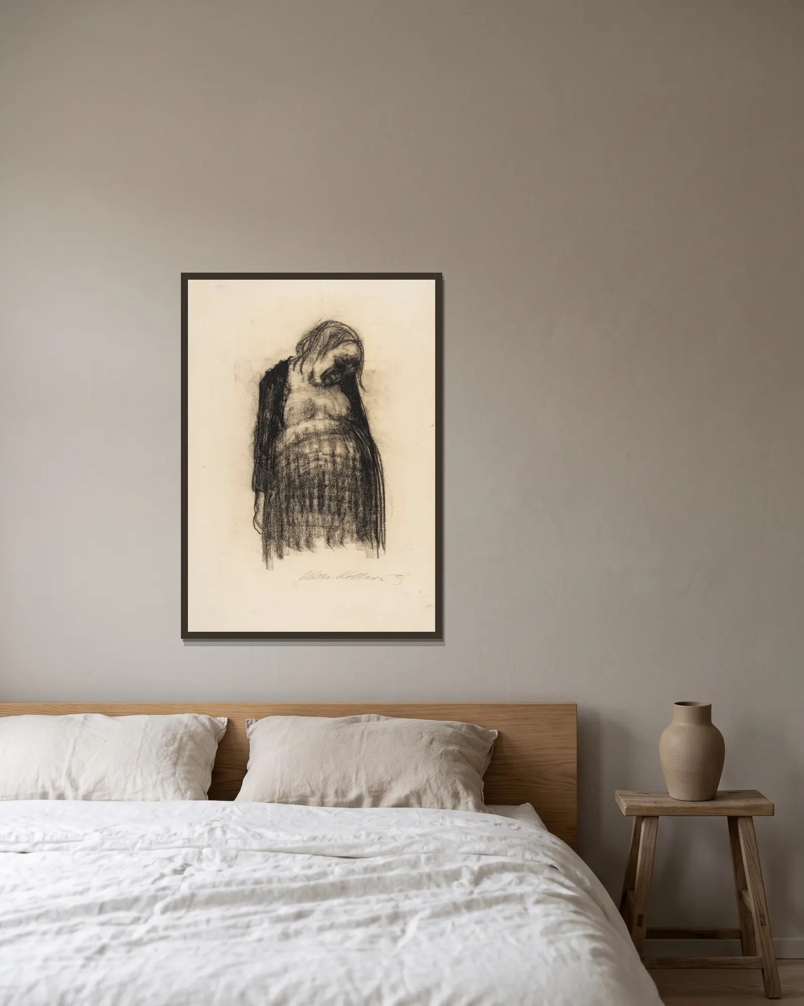Schwangere av Käthe Kollwitz inramad på en vägg