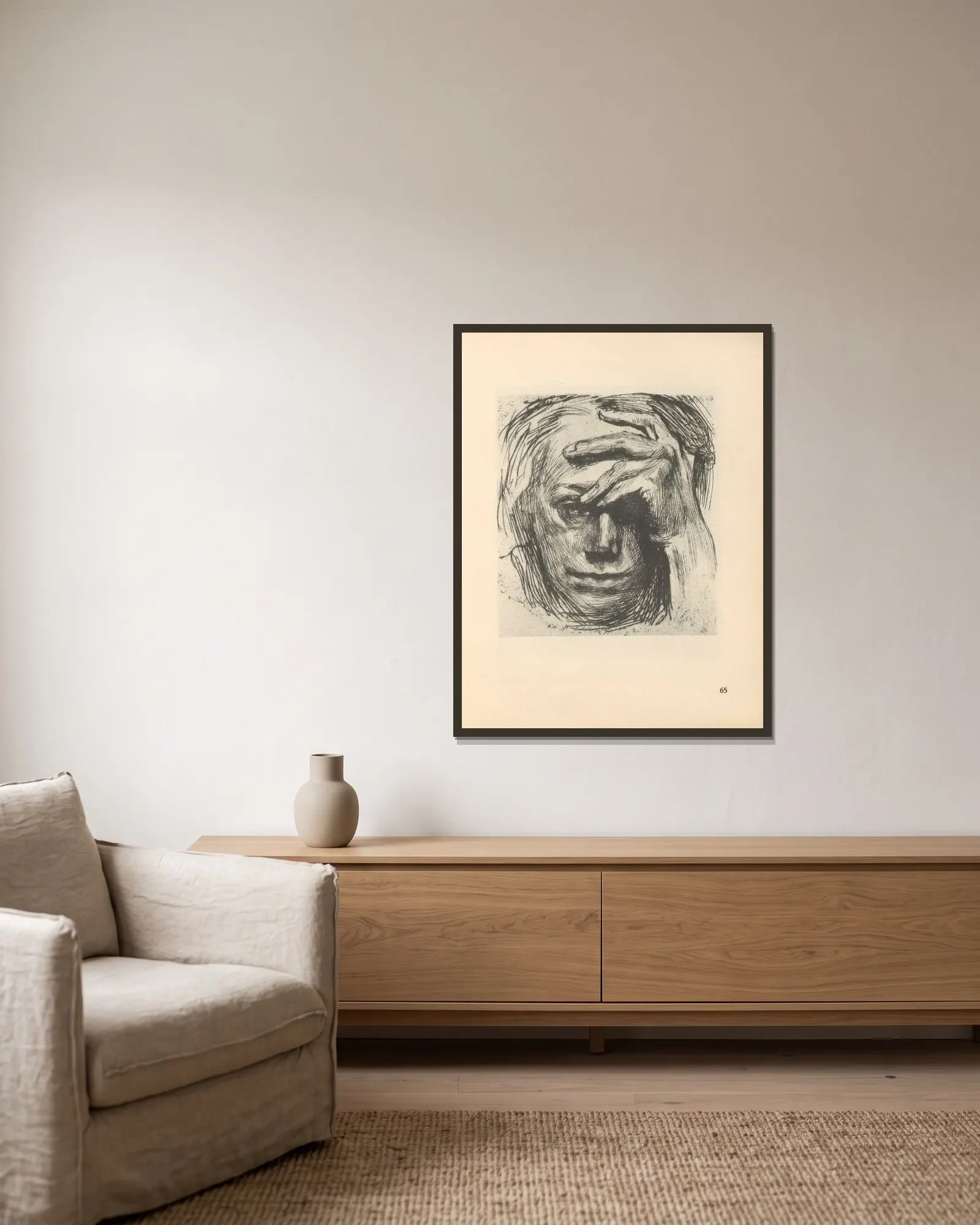 Selbstbildnis, 1925 – nr 1 av Käthe Kollwitz inramad på en vägg