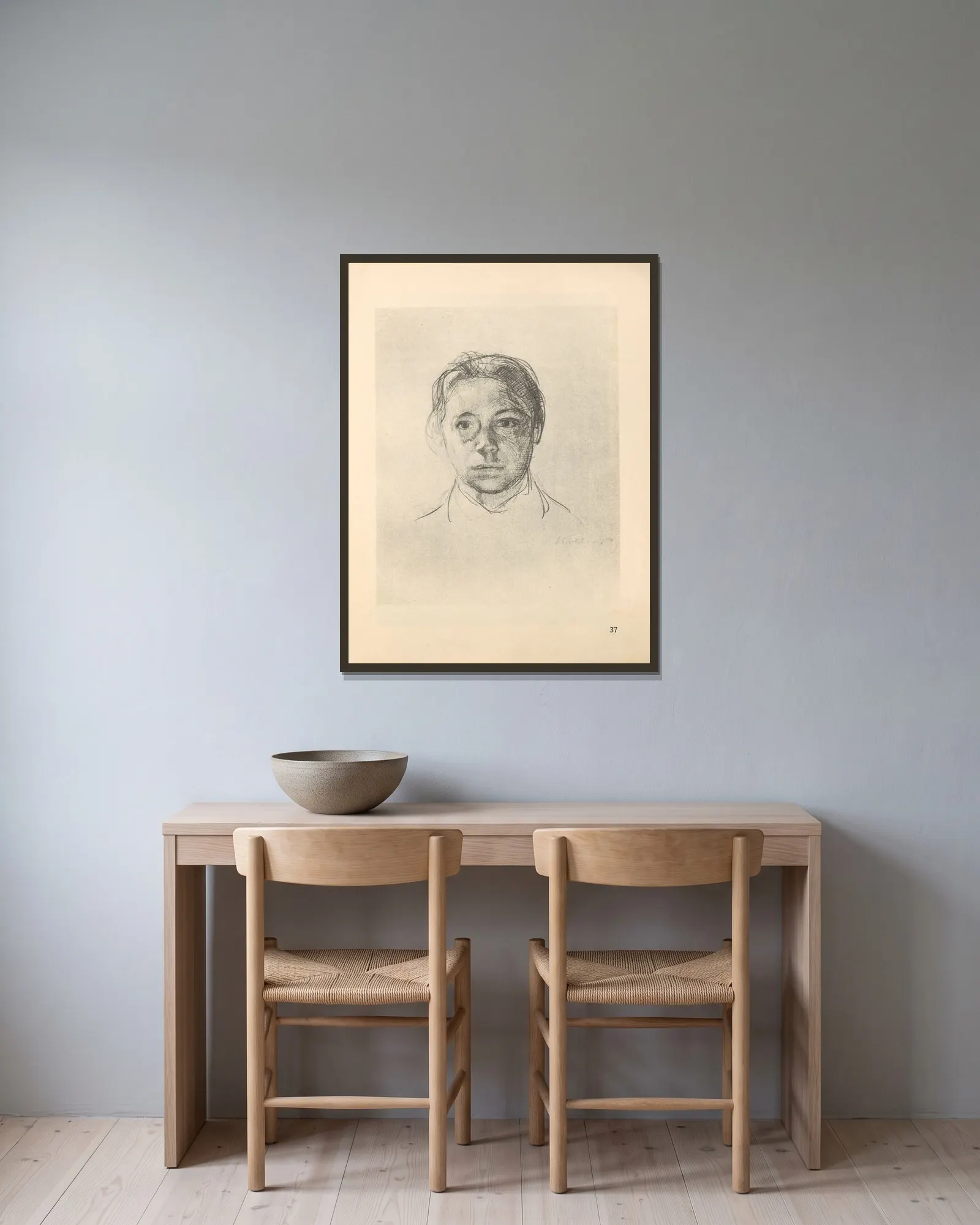 Selbstbildnis, 1925 – nr 2 av Käthe Kollwitz inramad på en vägg