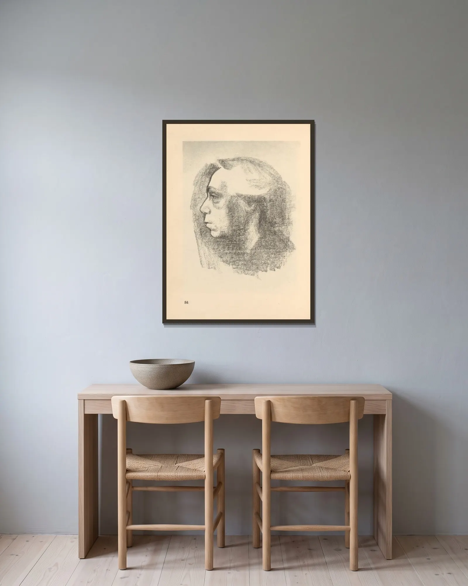 Selbstbildnis, 1925 – nr 5 av Käthe Kollwitz inramad på en vägg