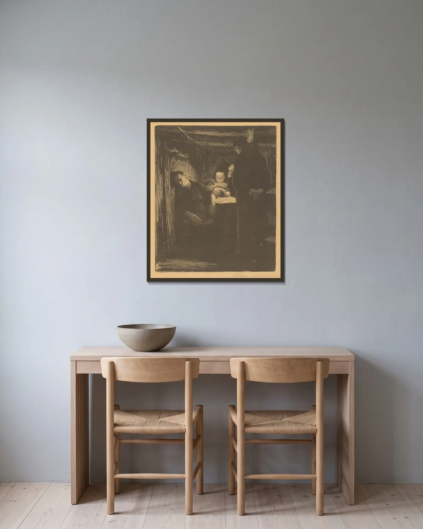 Smrť av Käthe Kollwitz inramad på en vägg