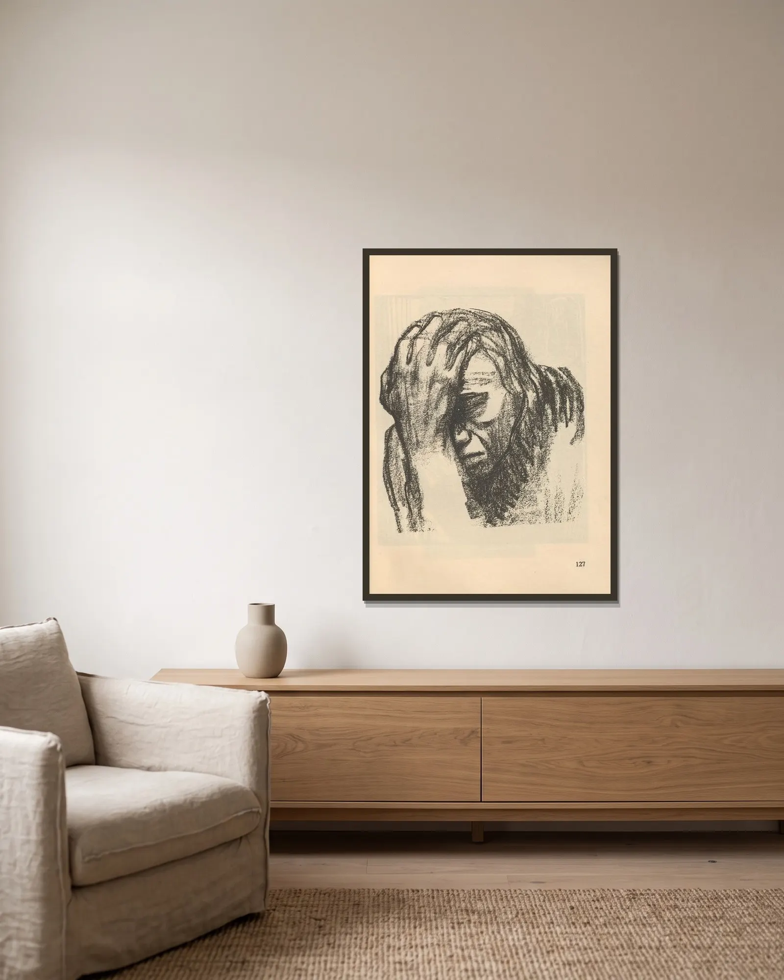 Studie av Käthe Kollwitz inramad på en vägg