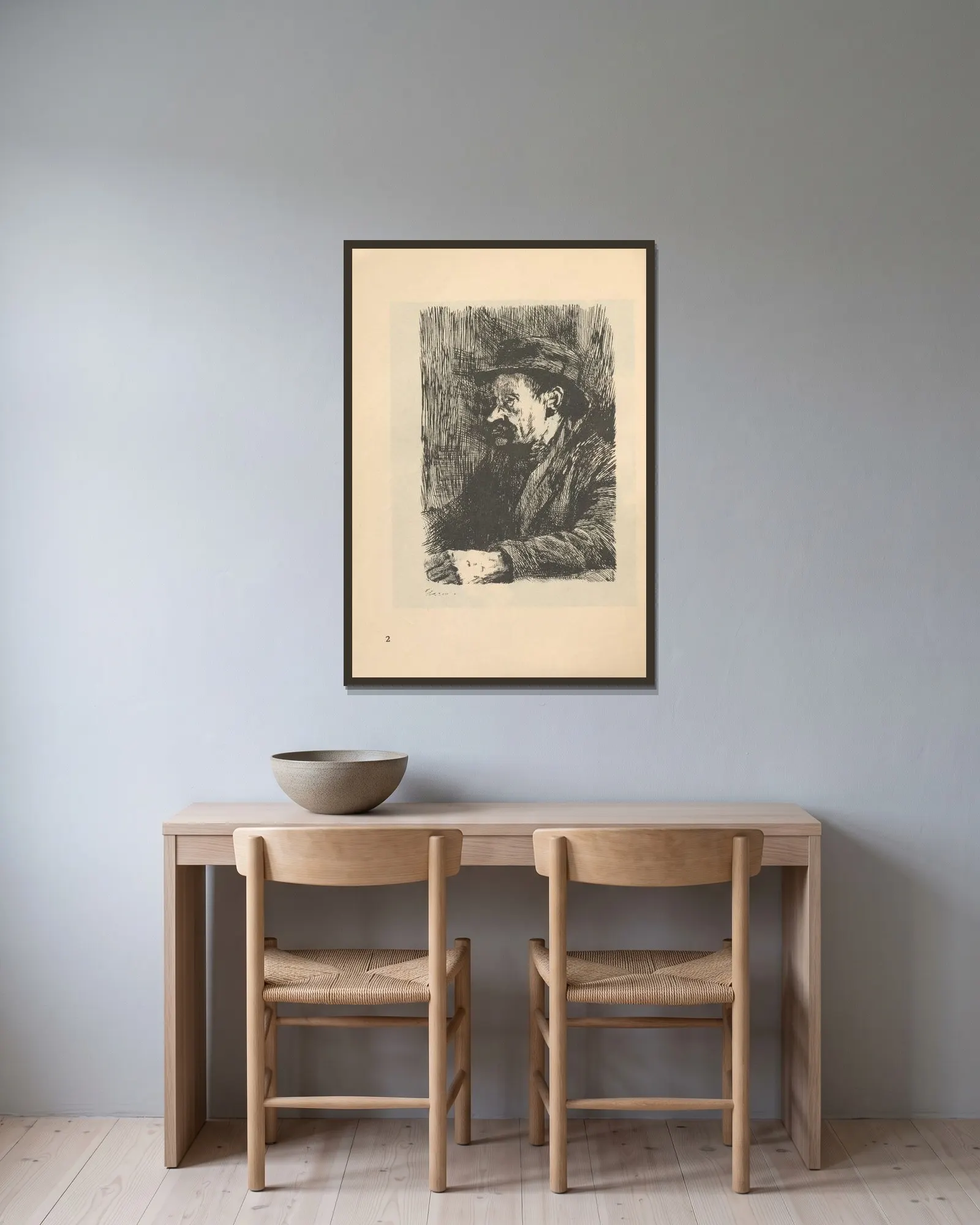 Studien av Käthe Kollwitz inramad på en vägg