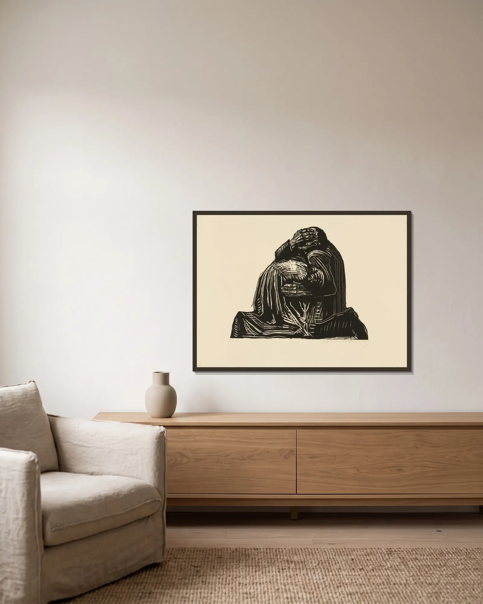 The Parents (Die Eltern) av Käthe Kollwitz inramad på en vägg
