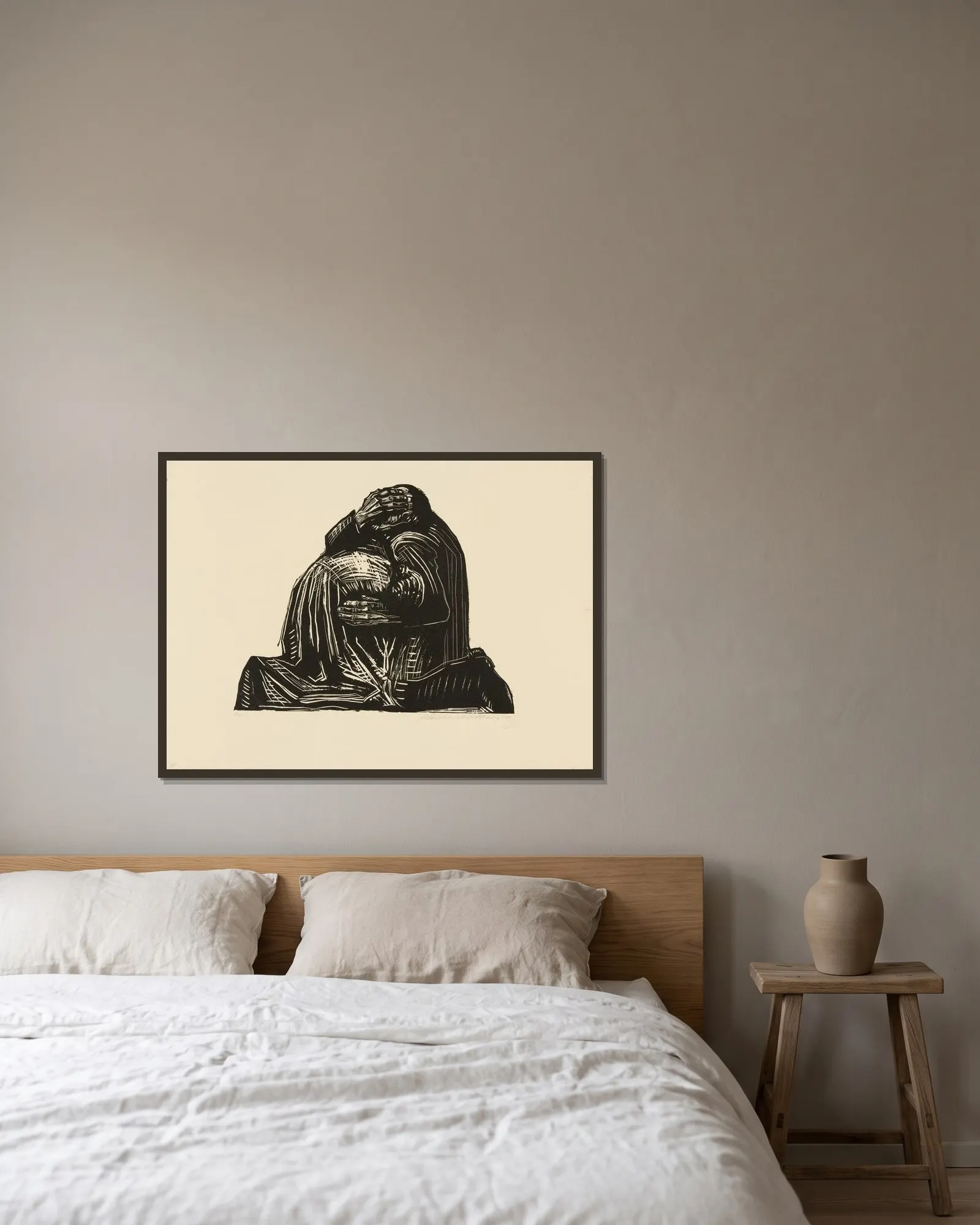 The Parents (Die Eltern) av Käthe Kollwitz inramad på en vägg