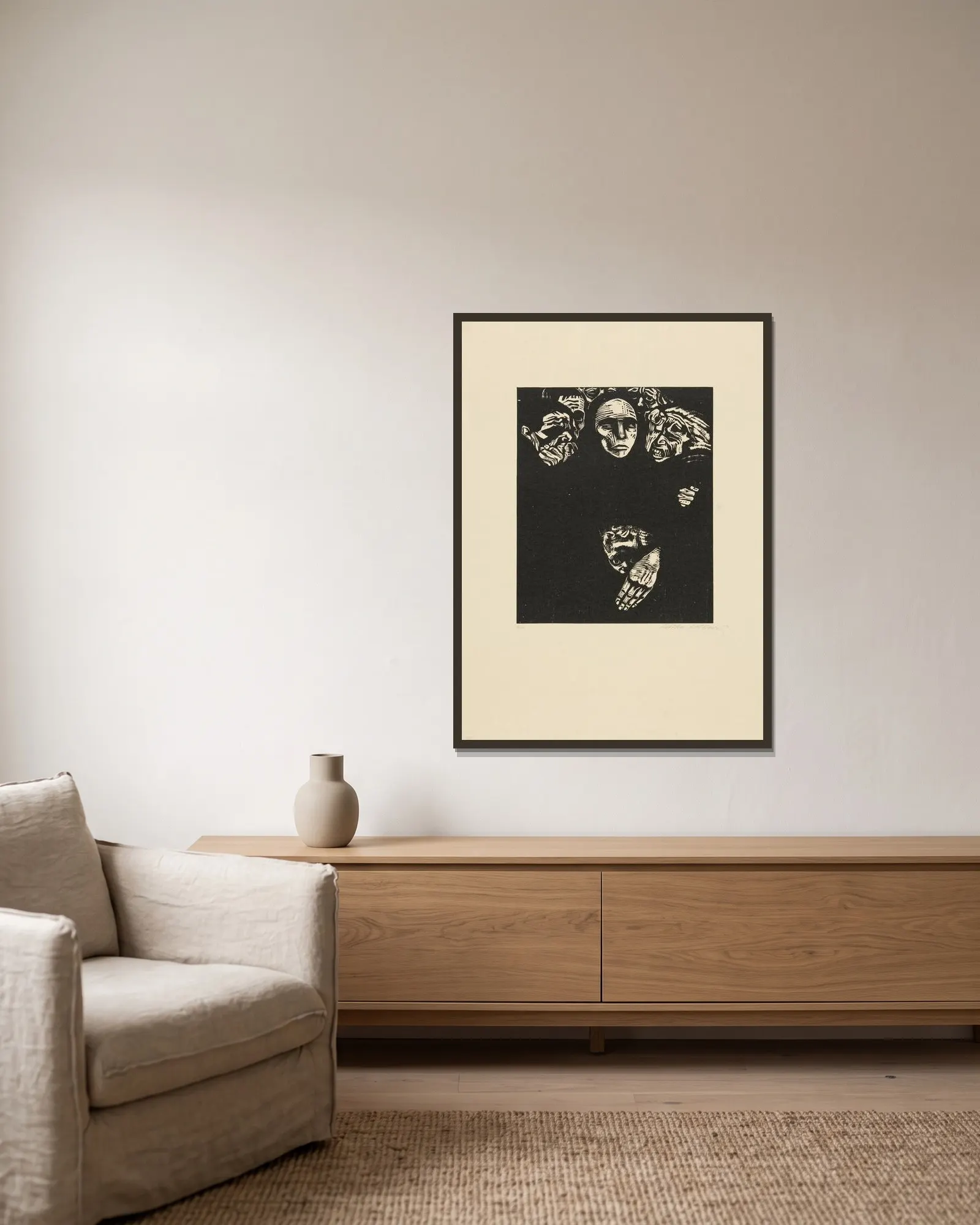 The People (Das Volk) av Käthe Kollwitz inramad på en vägg