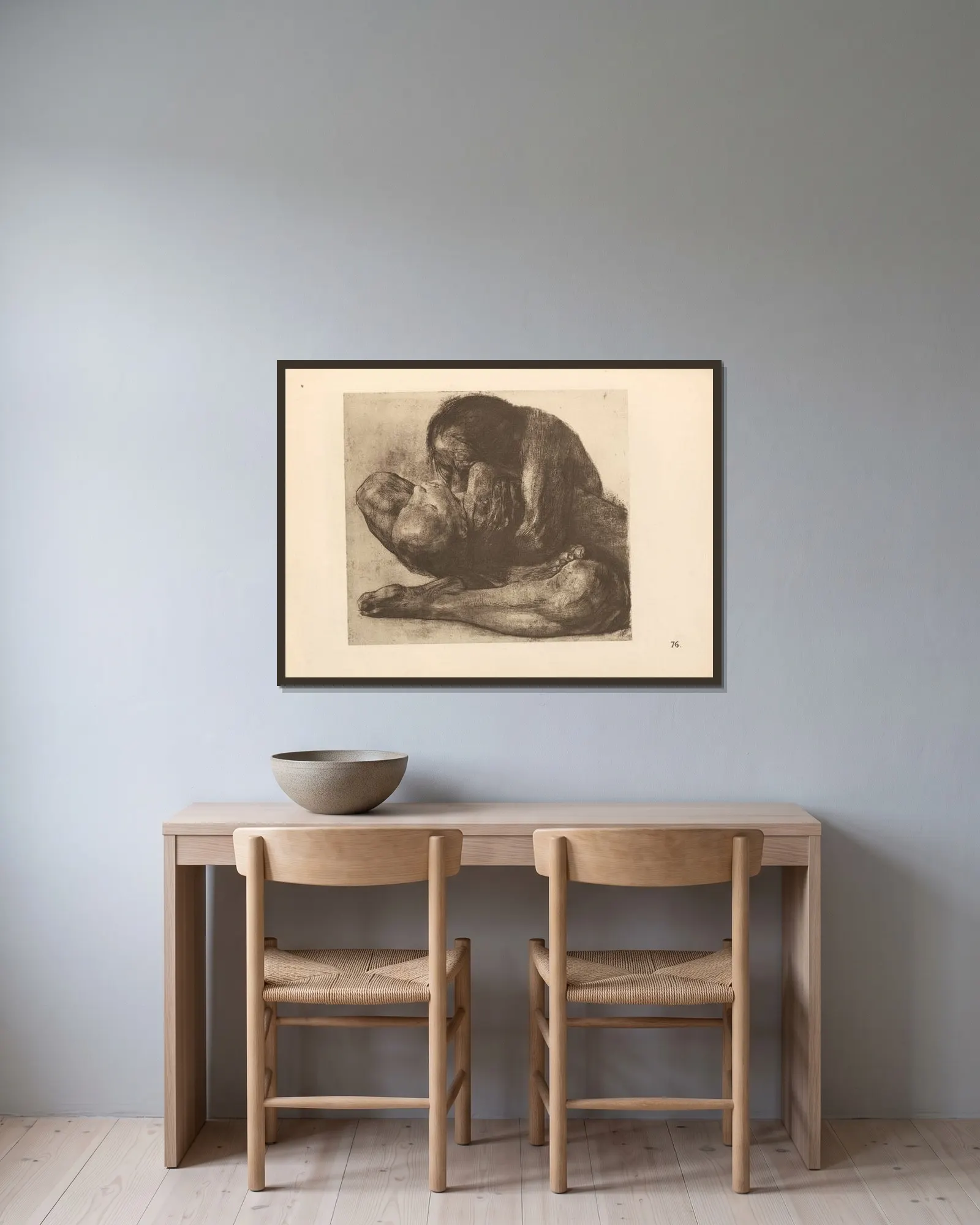 Totes Kind av Käthe Kollwitz inramad på en vägg