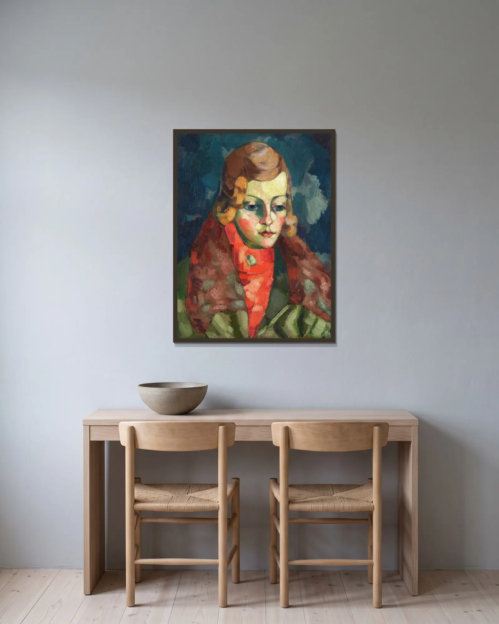 Daami portree av Konrad Mägi inramad på en vägg
