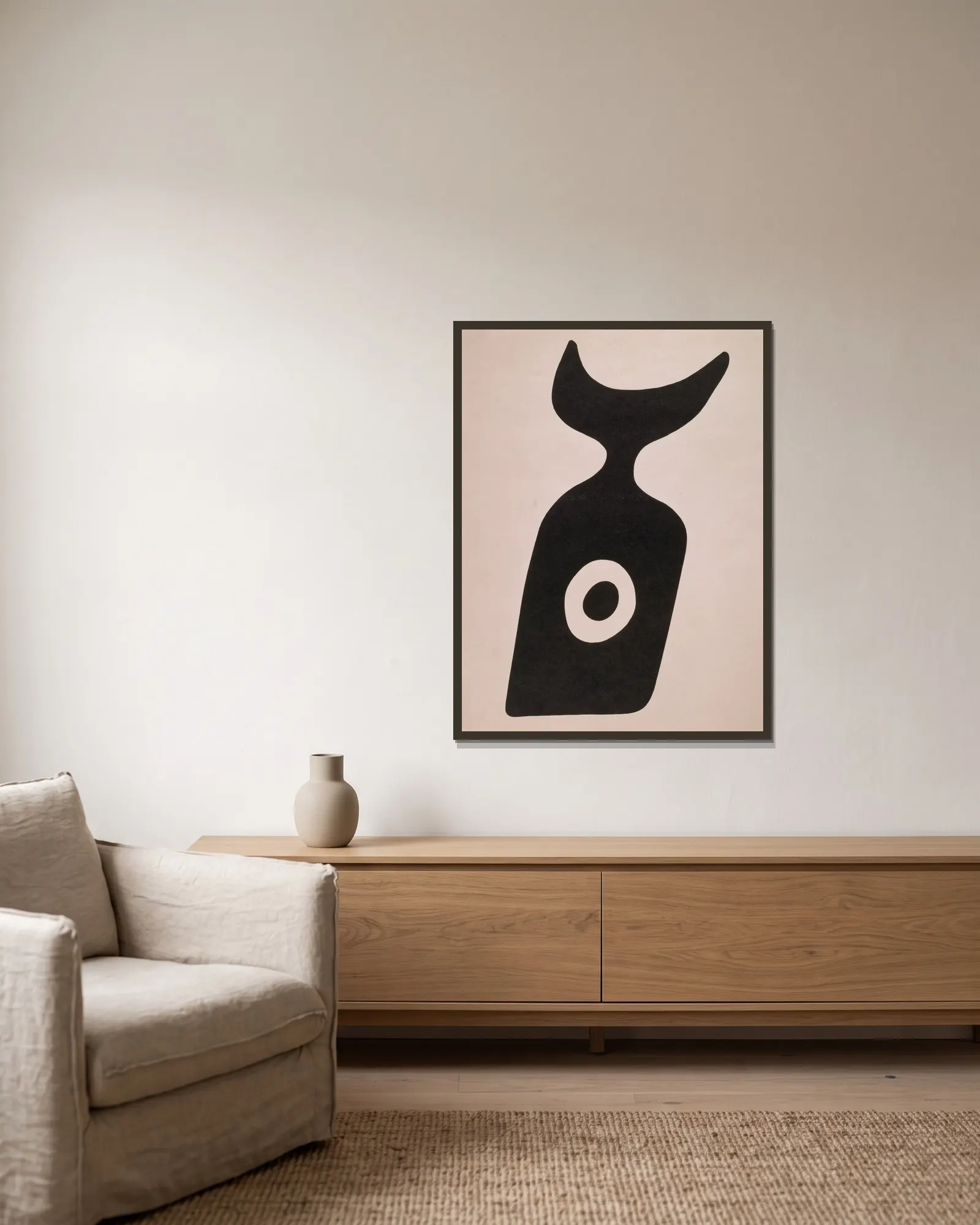 Die Nabelflasche av Kurt Schwitters inramad på en vägg