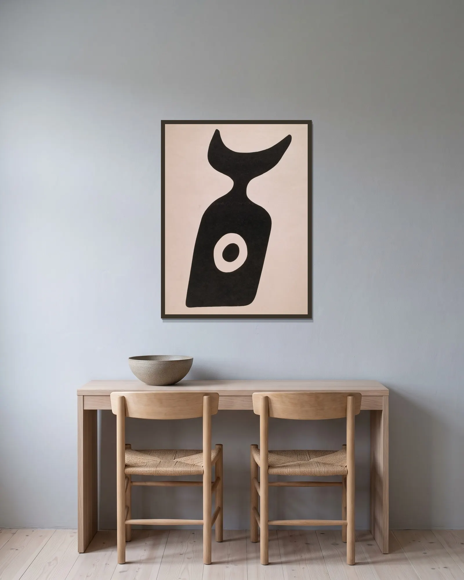 Die Nabelflasche av Kurt Schwitters inramad på en vägg