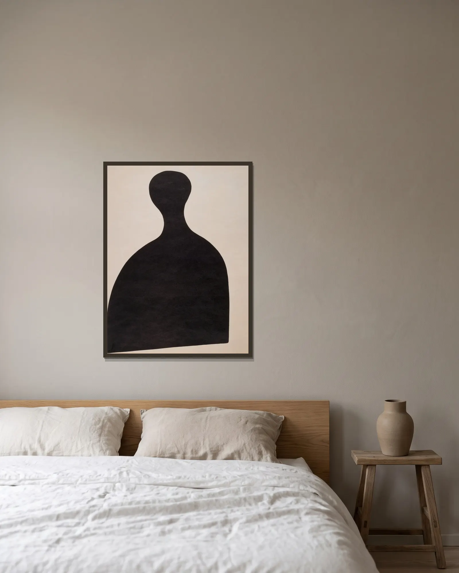 Eierschläger av Kurt Schwitters inramad på en vägg