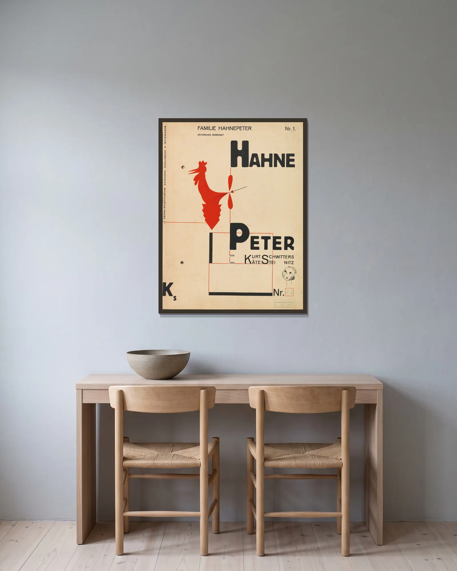 Hahne Peter av Kurt Schwitters inramad på en vägg