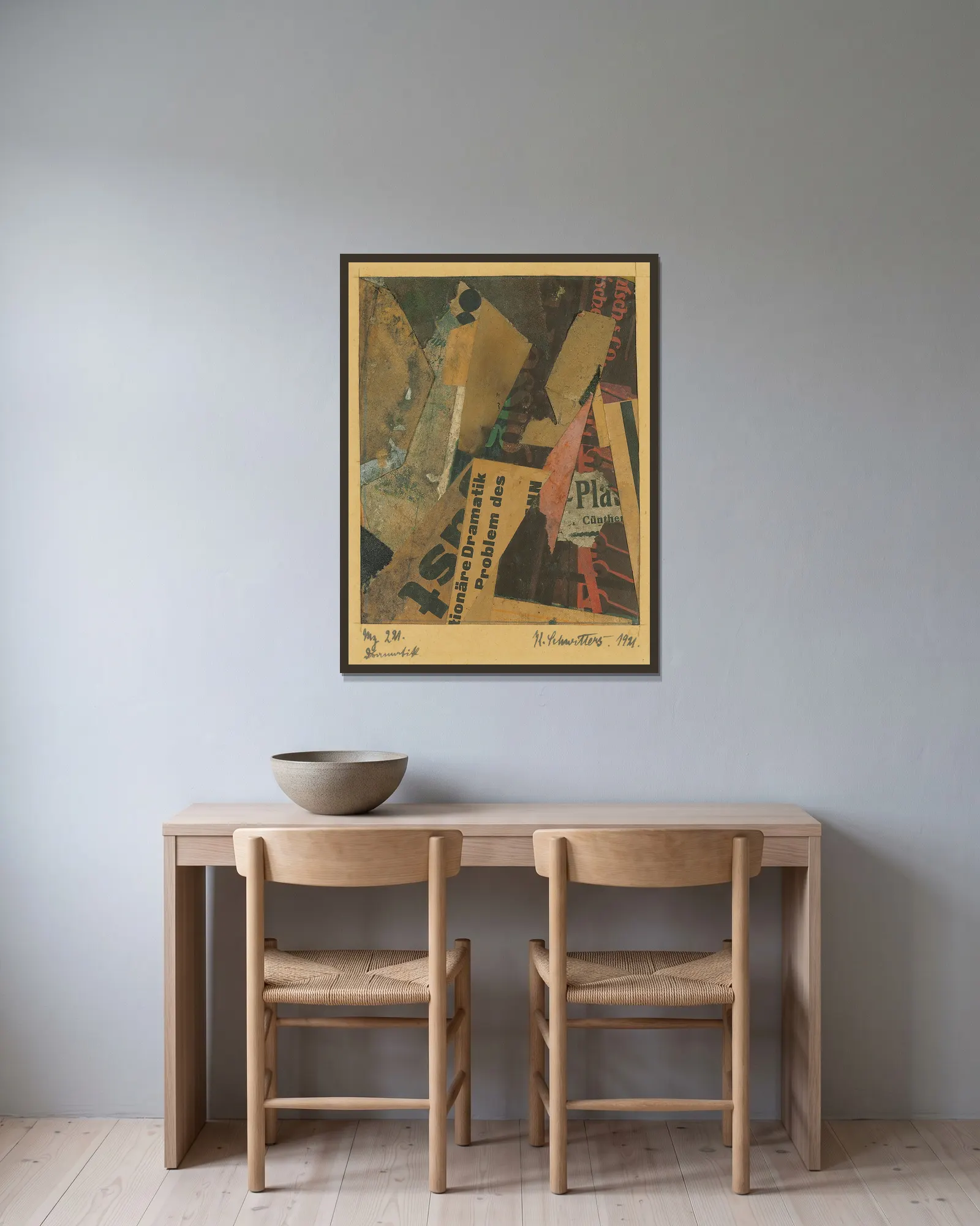 Mz 221. Dramatik av Kurt Schwitters inramad på en vägg