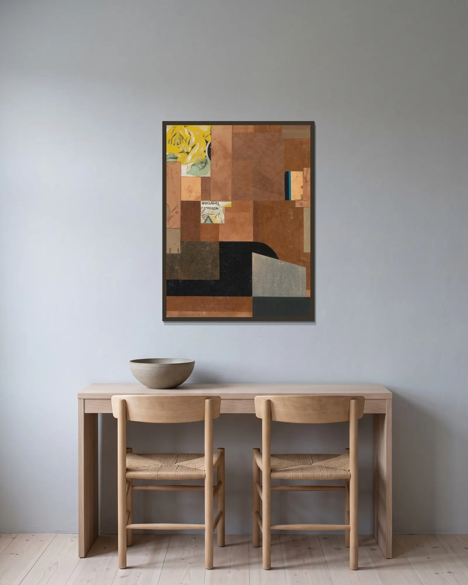 Tea Rose av Kurt Schwitters inramad på en vägg