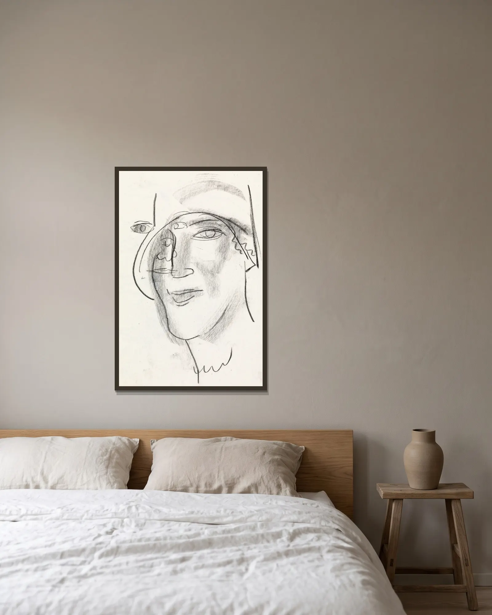 Vrouwen hoofd av Leo Gestel inramad på en vägg