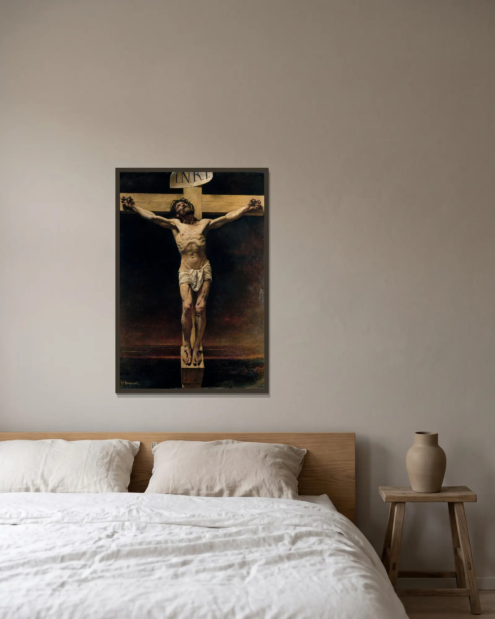 Le Christ en croix av Léon Bonnat inramad på en vägg