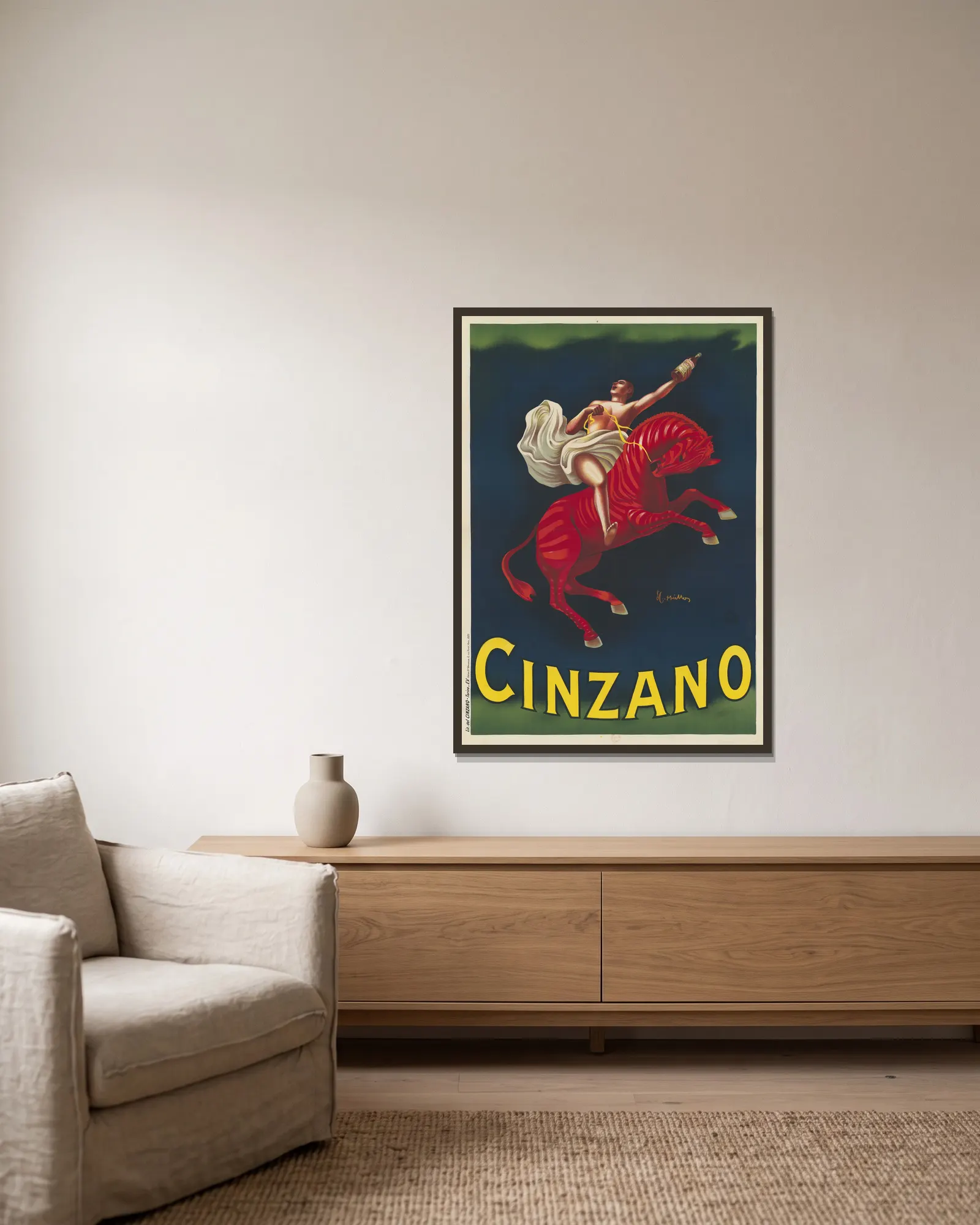 Cinzano av Leonetto Cappiello inramad på en vägg
