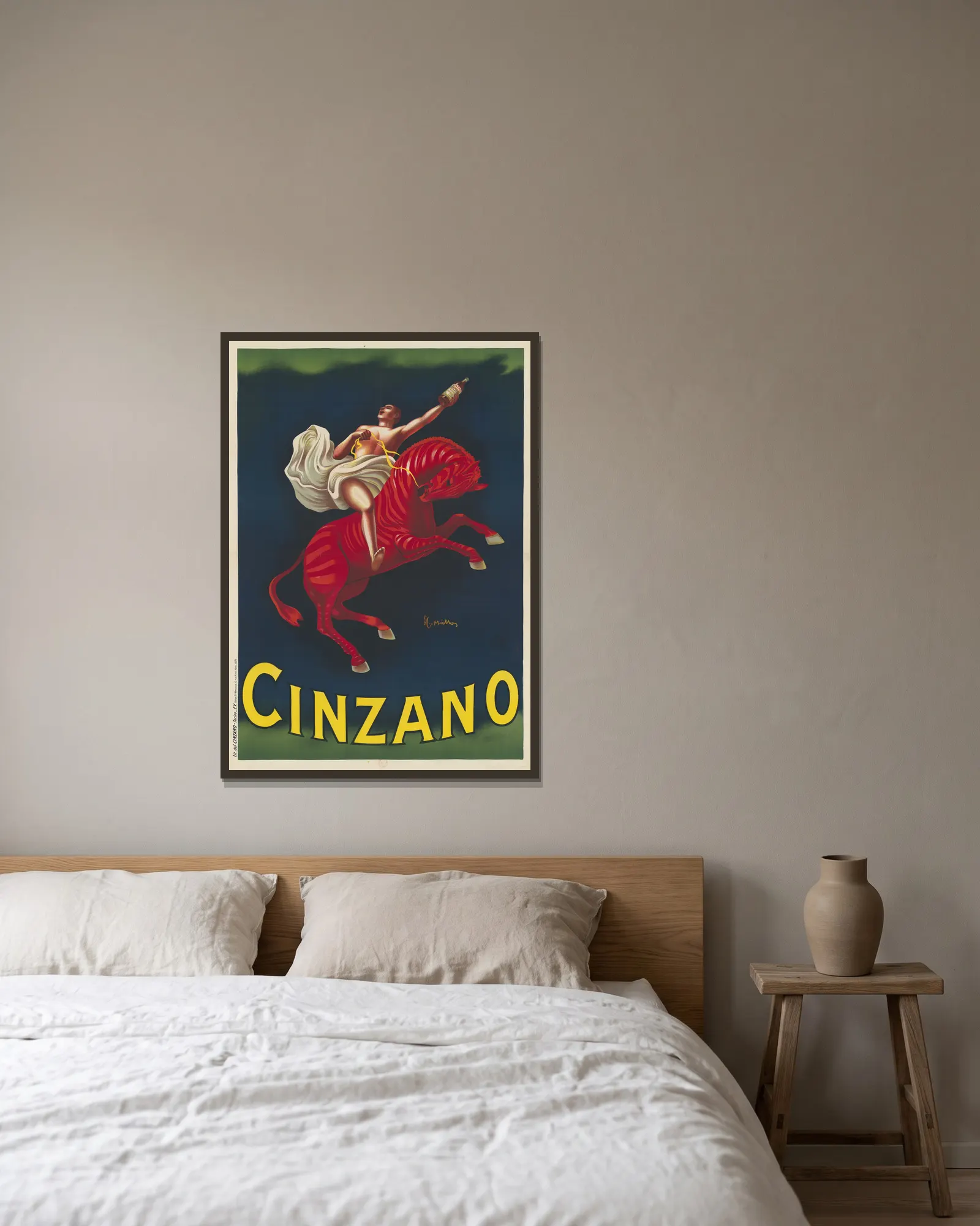 Cinzano av Leonetto Cappiello inramad på en vägg