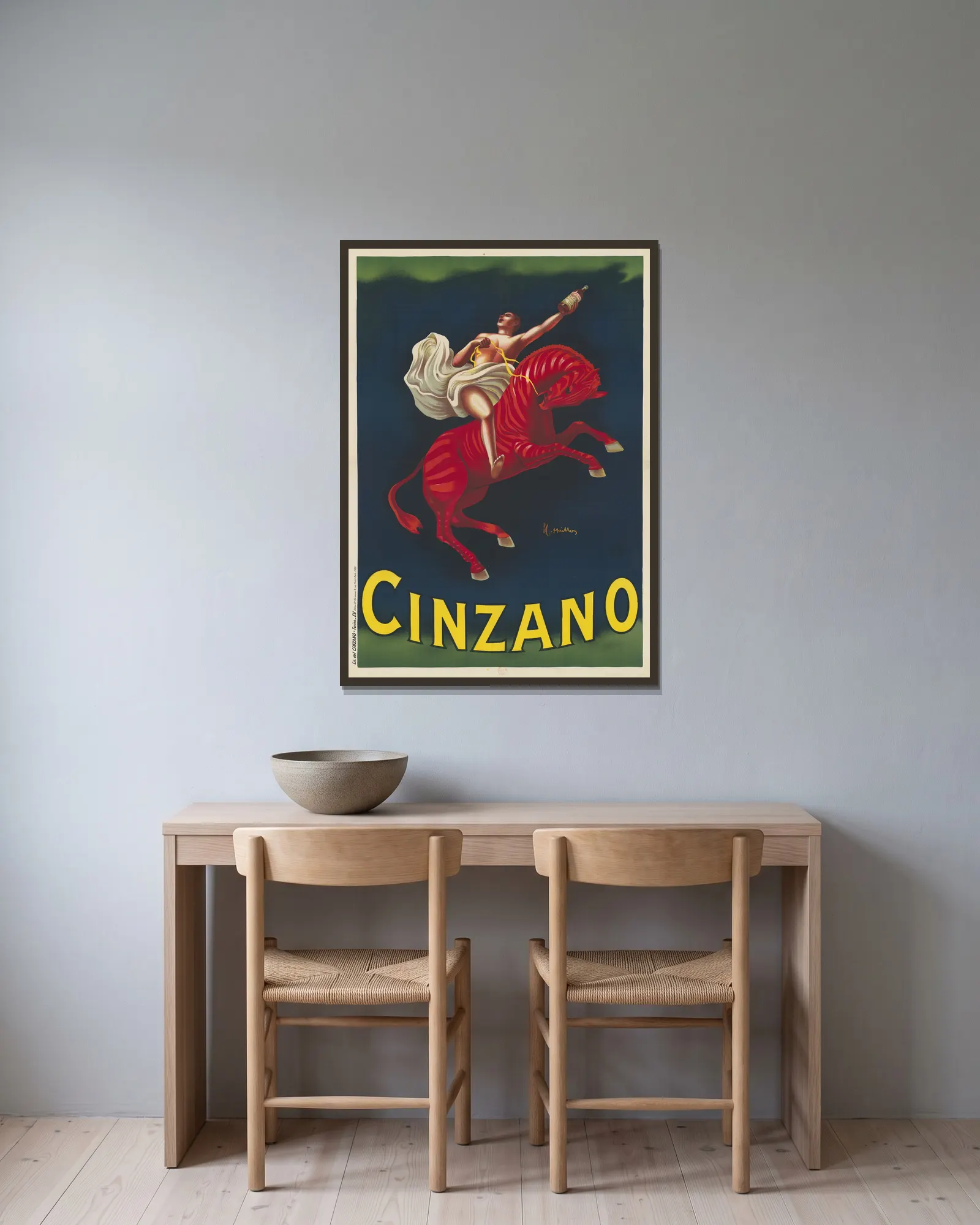 Cinzano av Leonetto Cappiello inramad på en vägg