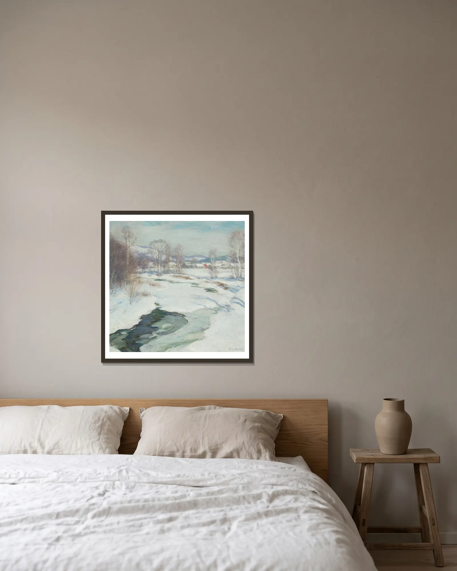 Icebound Brook av Willard Leroy Metcalf inramad på en vägg
