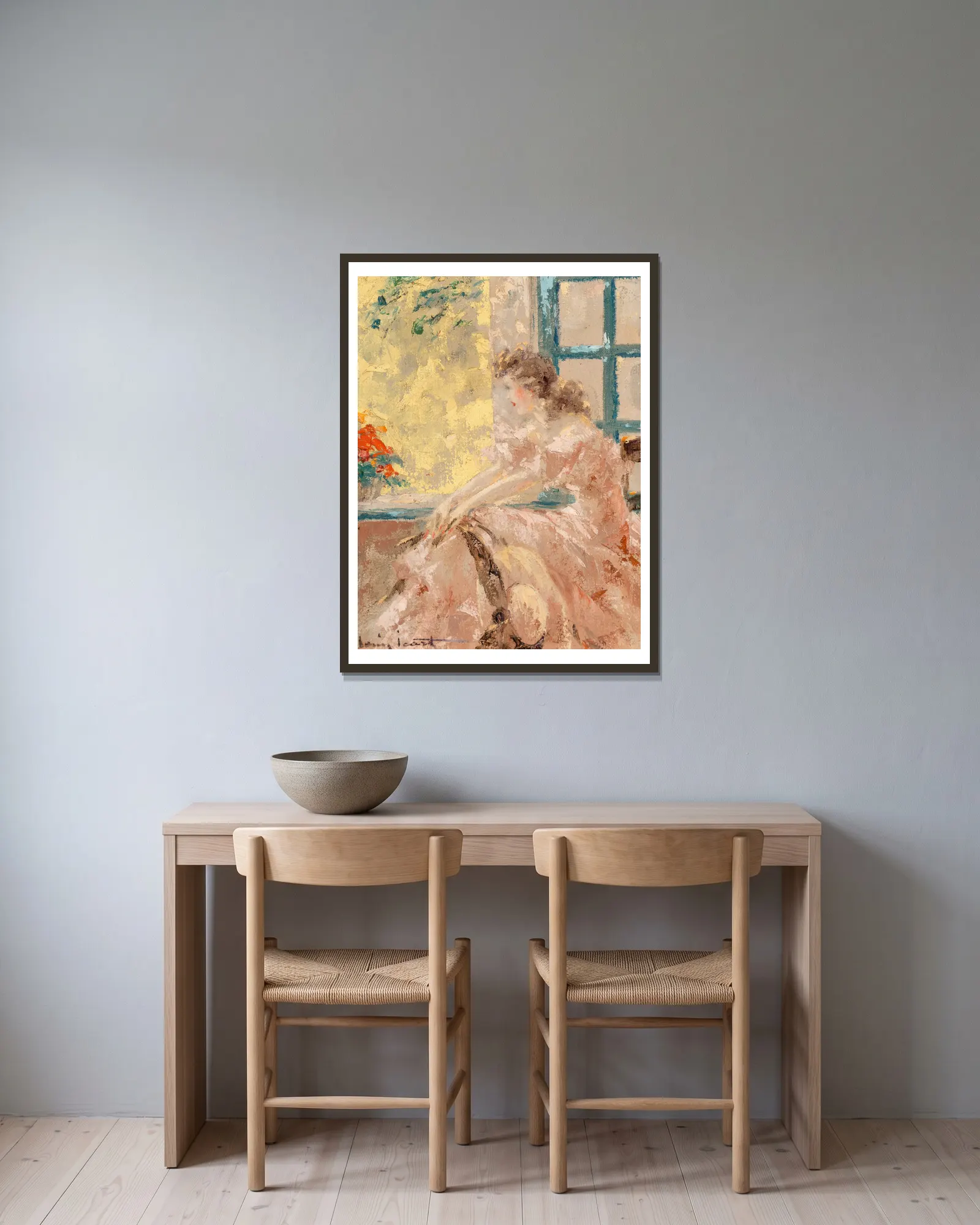 Pensive (Matin) av Louis Icart inramad på en vägg