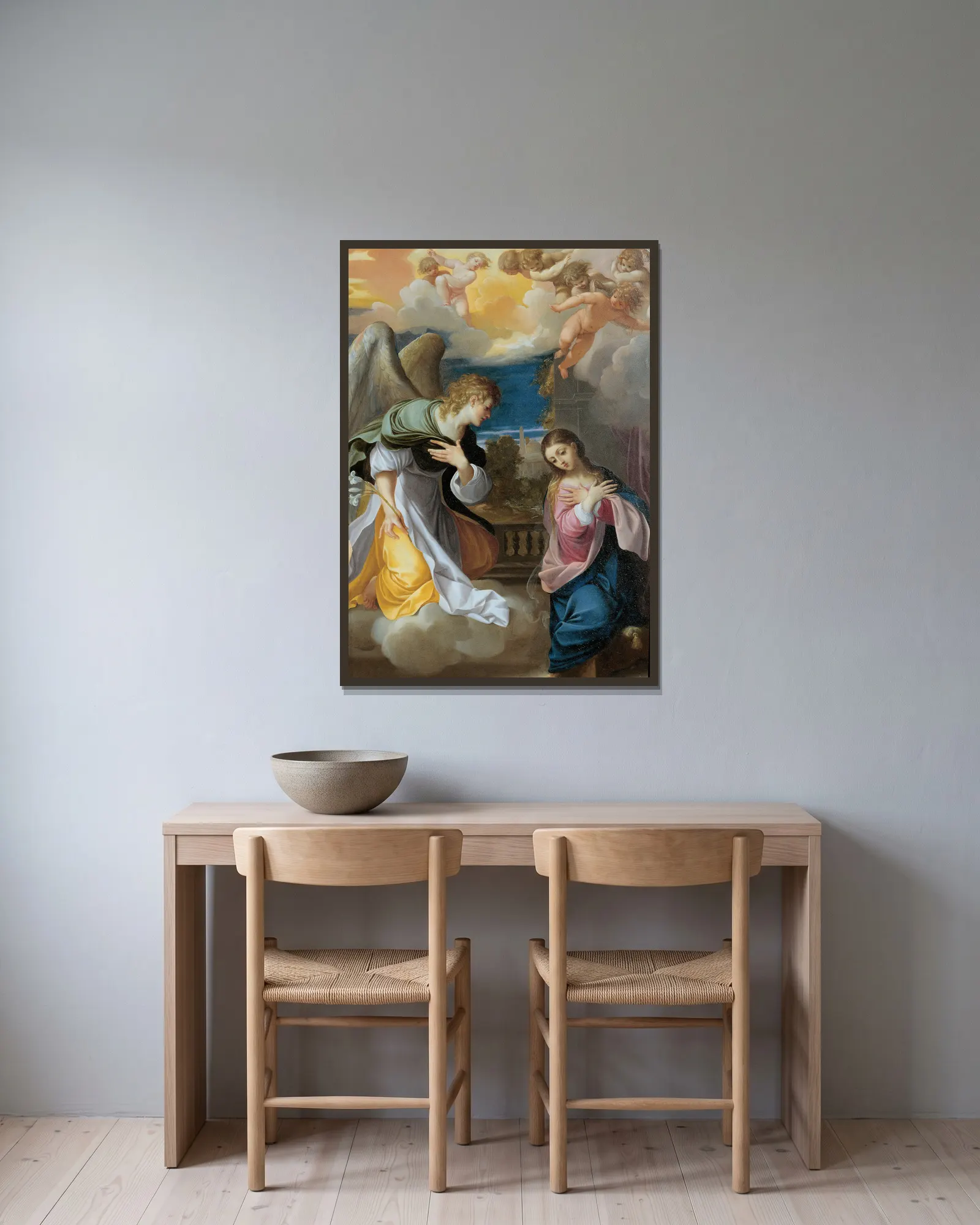 Annunciation av Ludovico Carracci inramad på en vägg