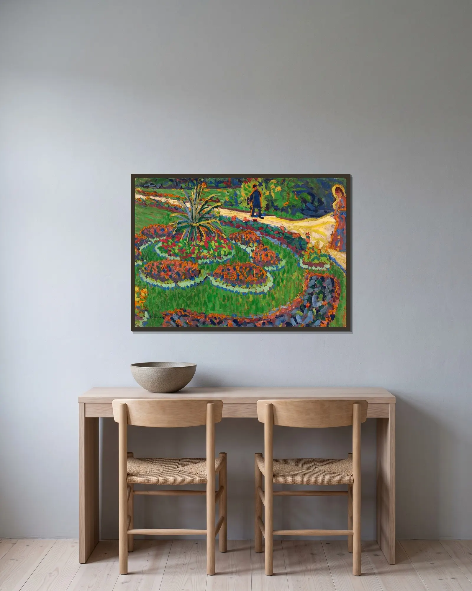 Im Park av Ernst Ludwig Kirchner inramad på en vägg