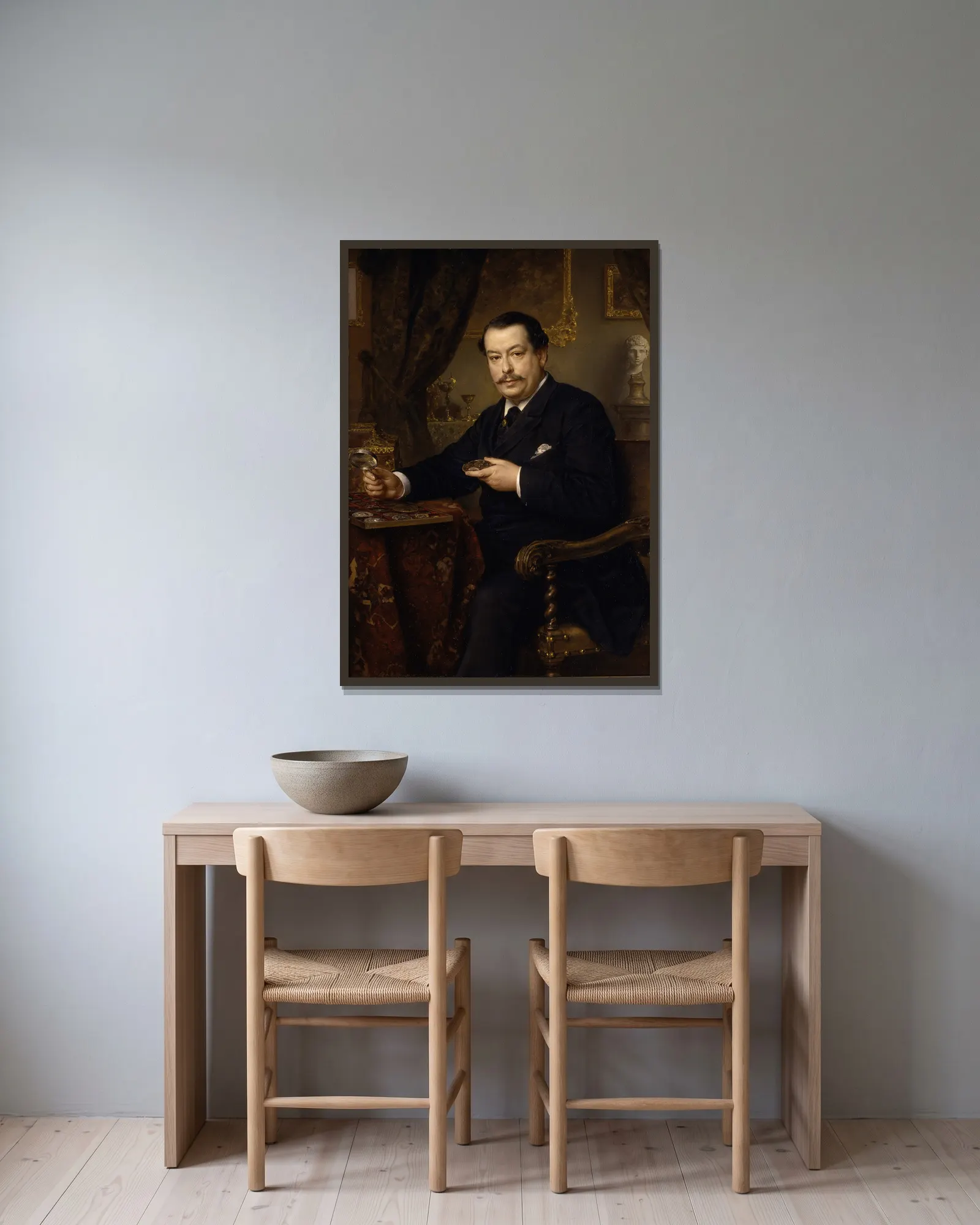 The banker Itzinger av Ludwig Knaus inramad på en vägg