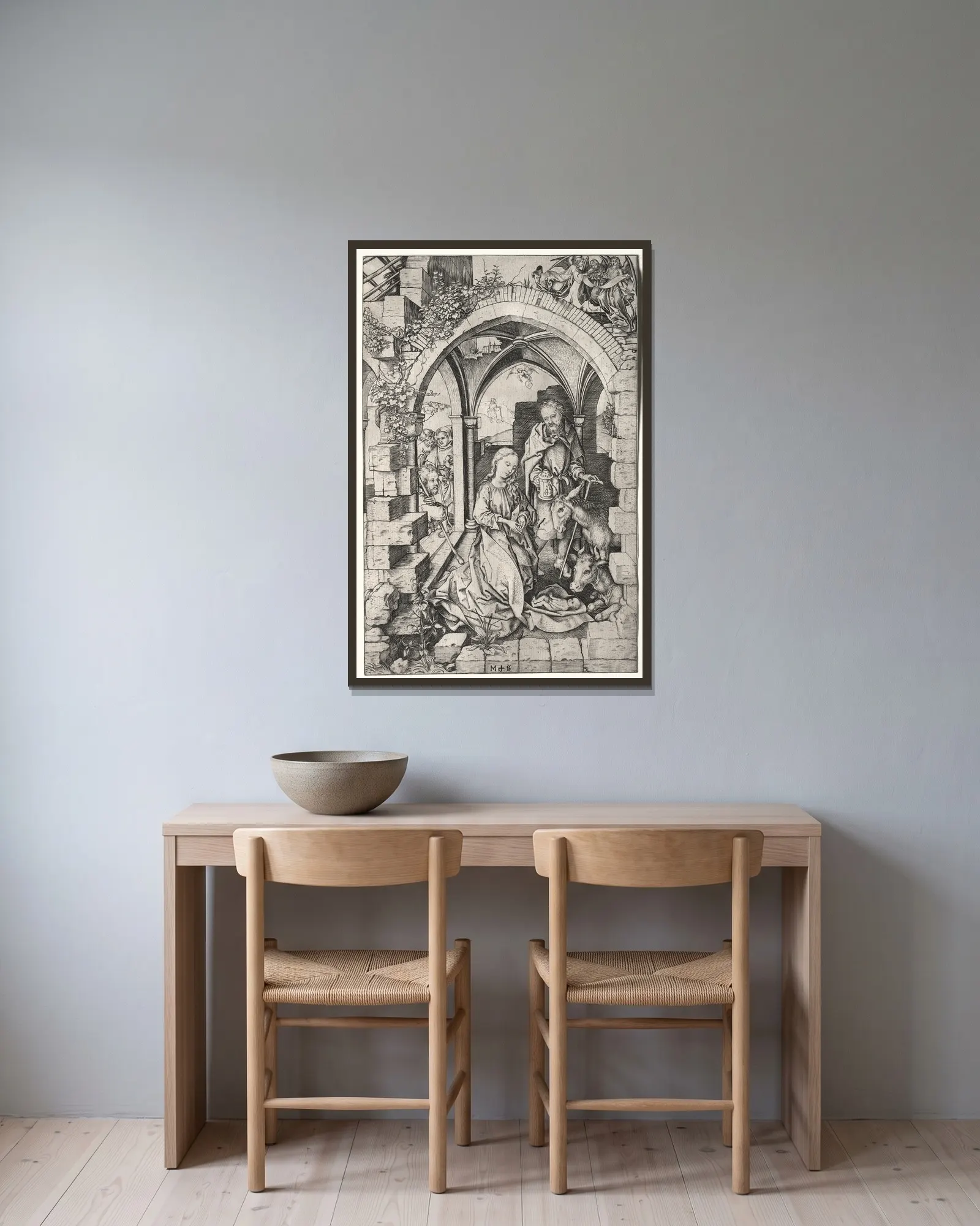 The Nativity av Martin Schongauer inramad på en vägg