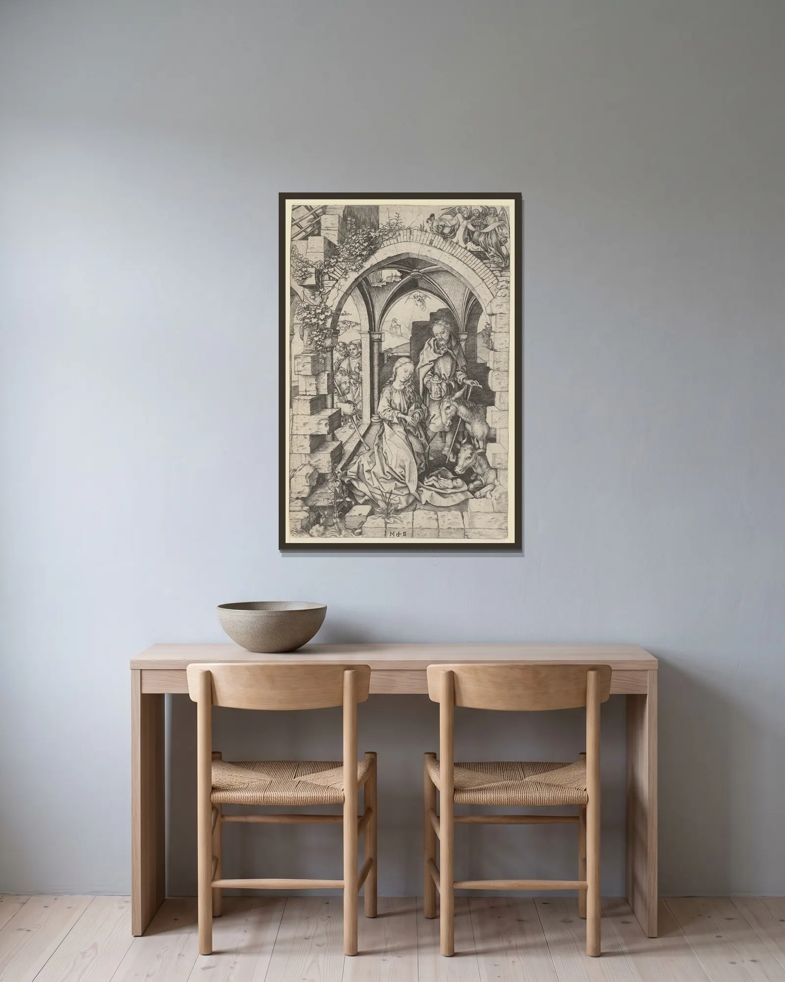 The Nativity av Martin Schongauer inramad på en vägg