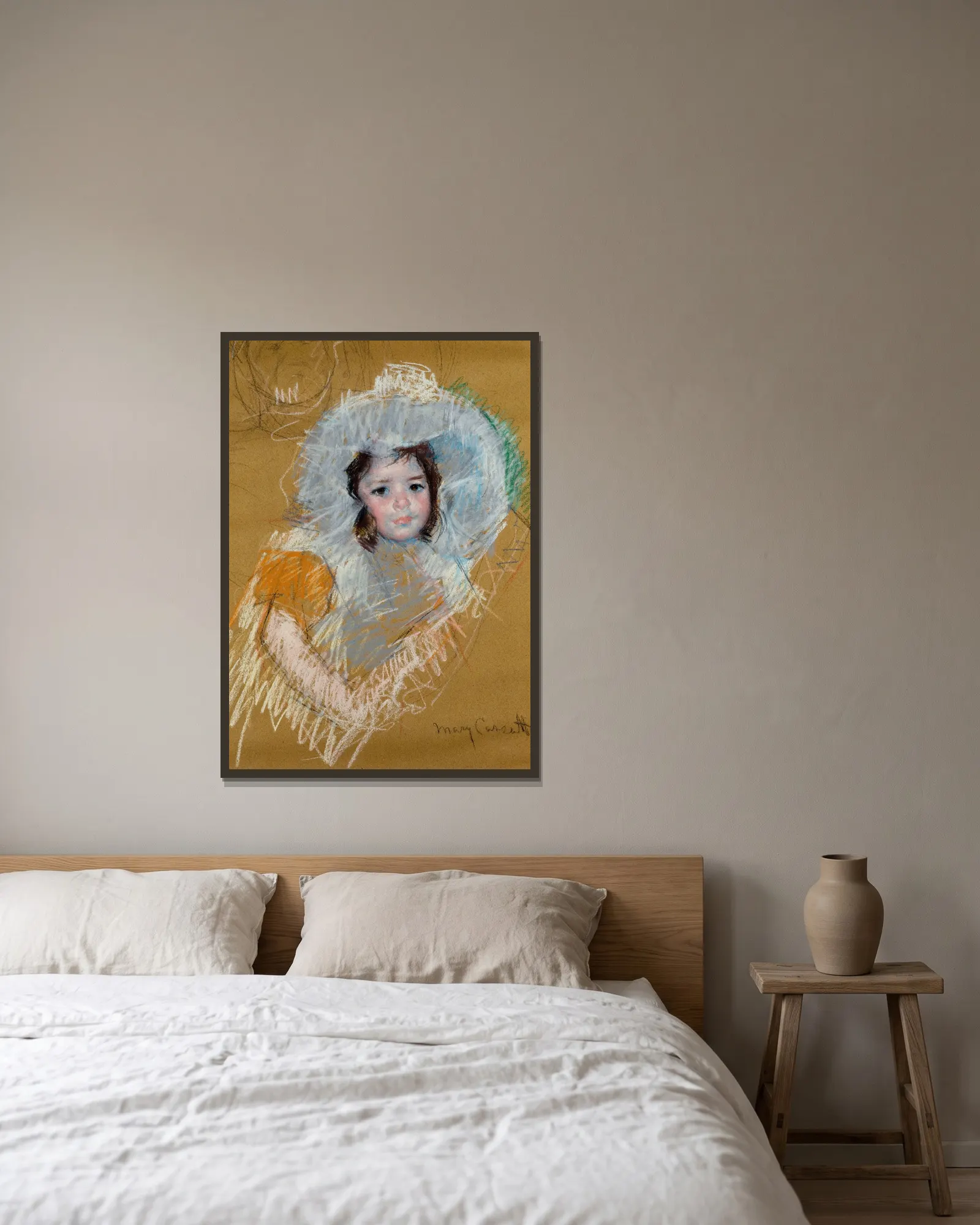 Buste de fillette av Mary Cassatt inramad på en vägg