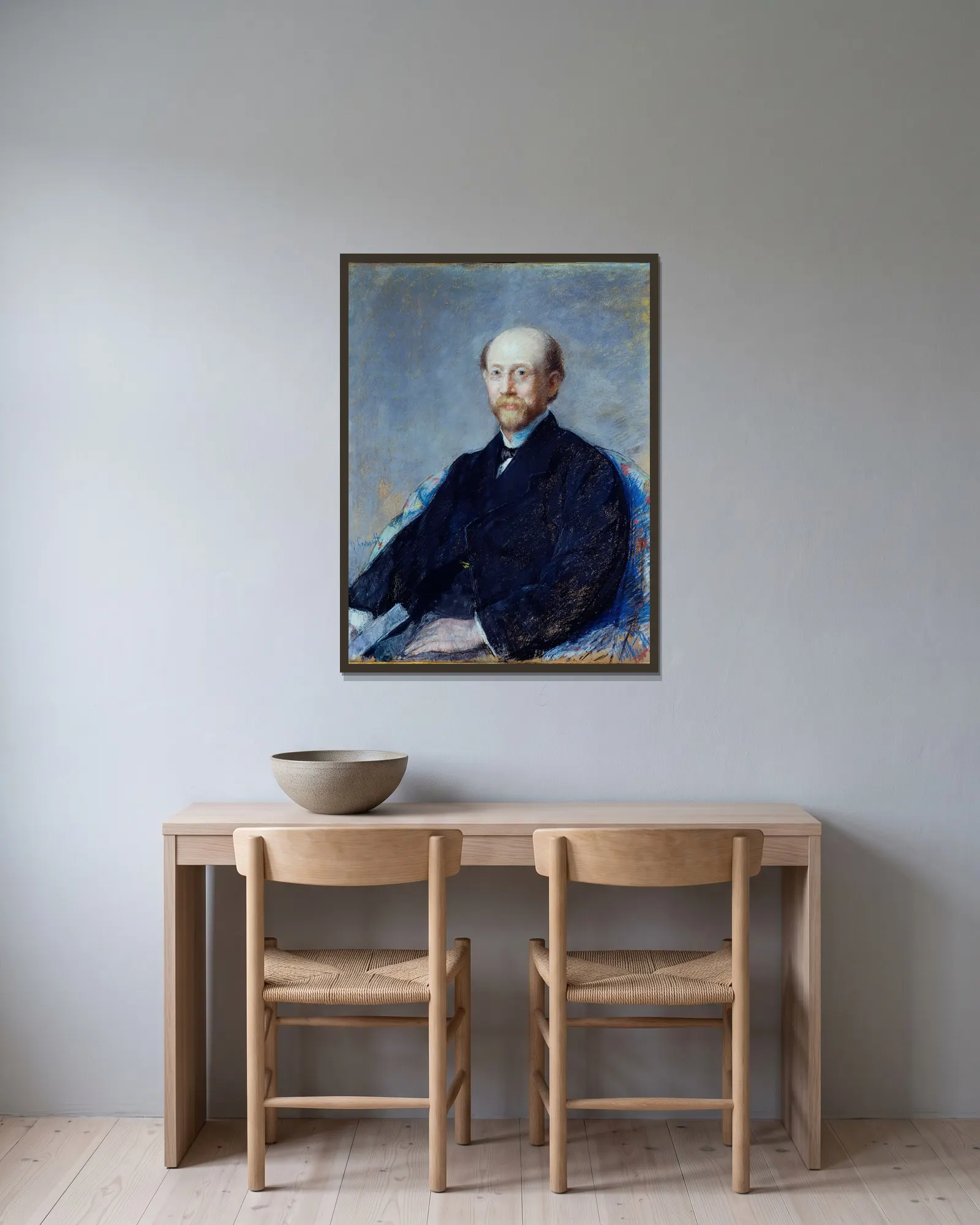 Portrait d’homme av Mary Cassatt inramad på en vägg