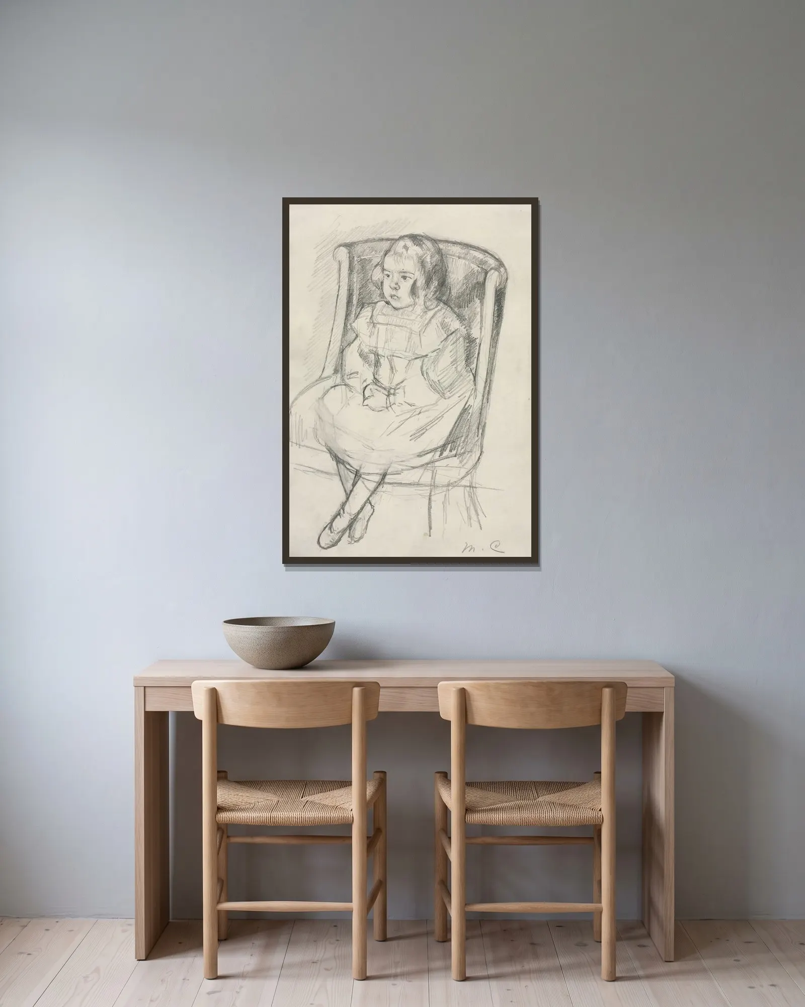 Simone Seated av Mary Cassatt inramad på en vägg