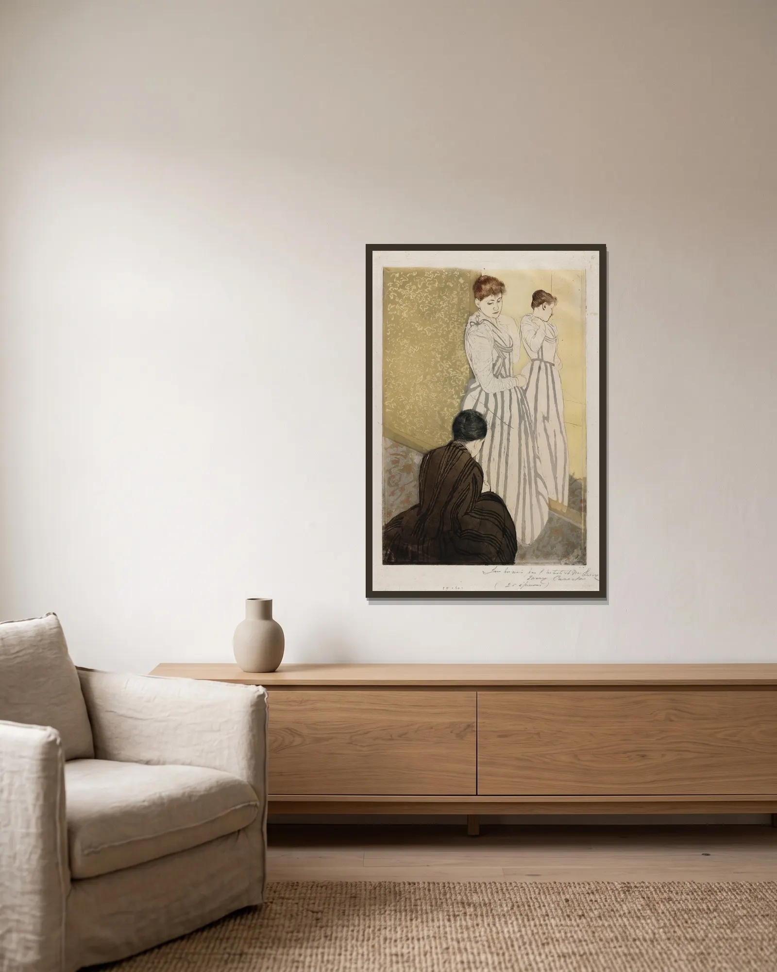 The Fitting av Mary Cassatt inramad på en vägg