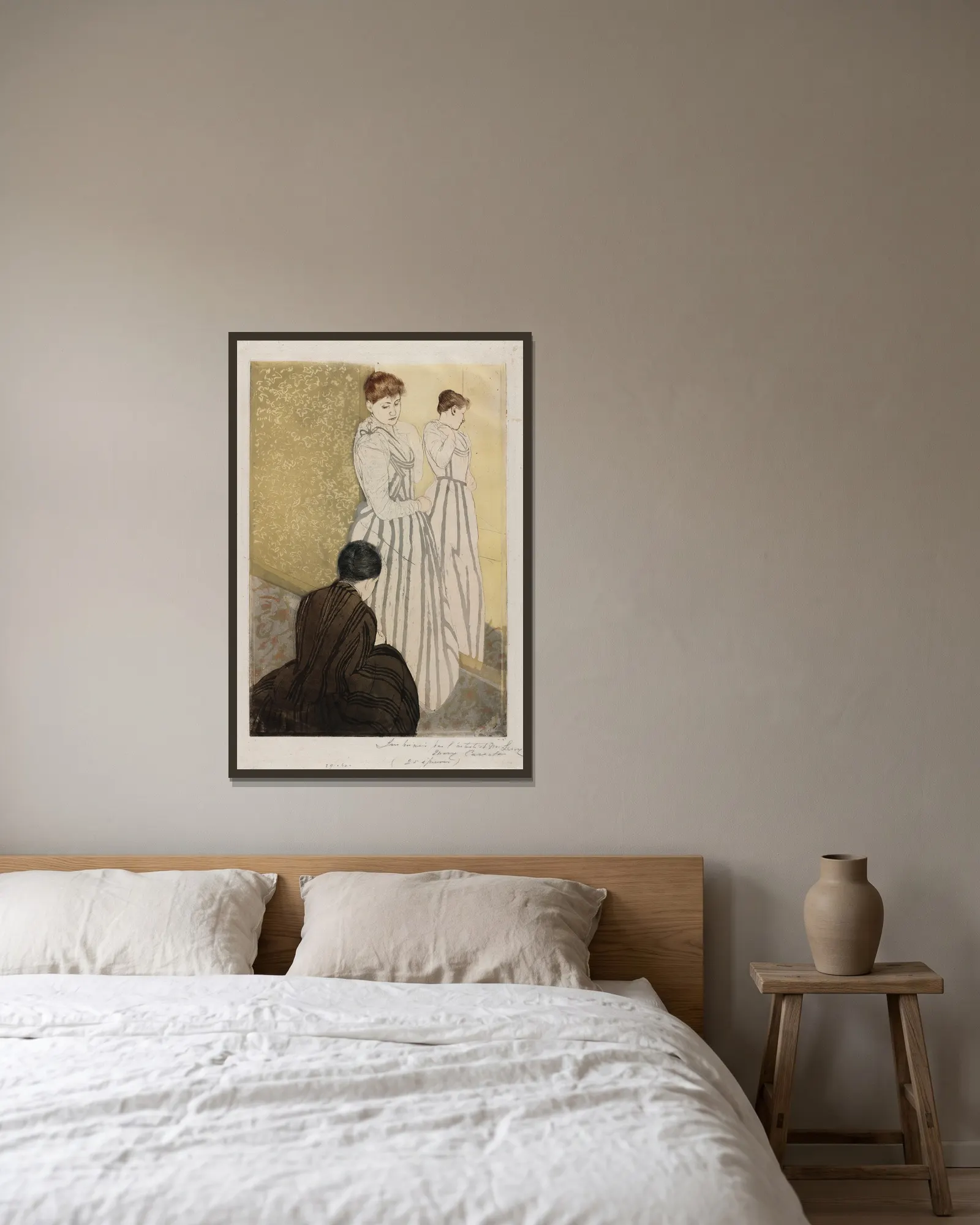 The Fitting av Mary Cassatt inramad på en vägg
