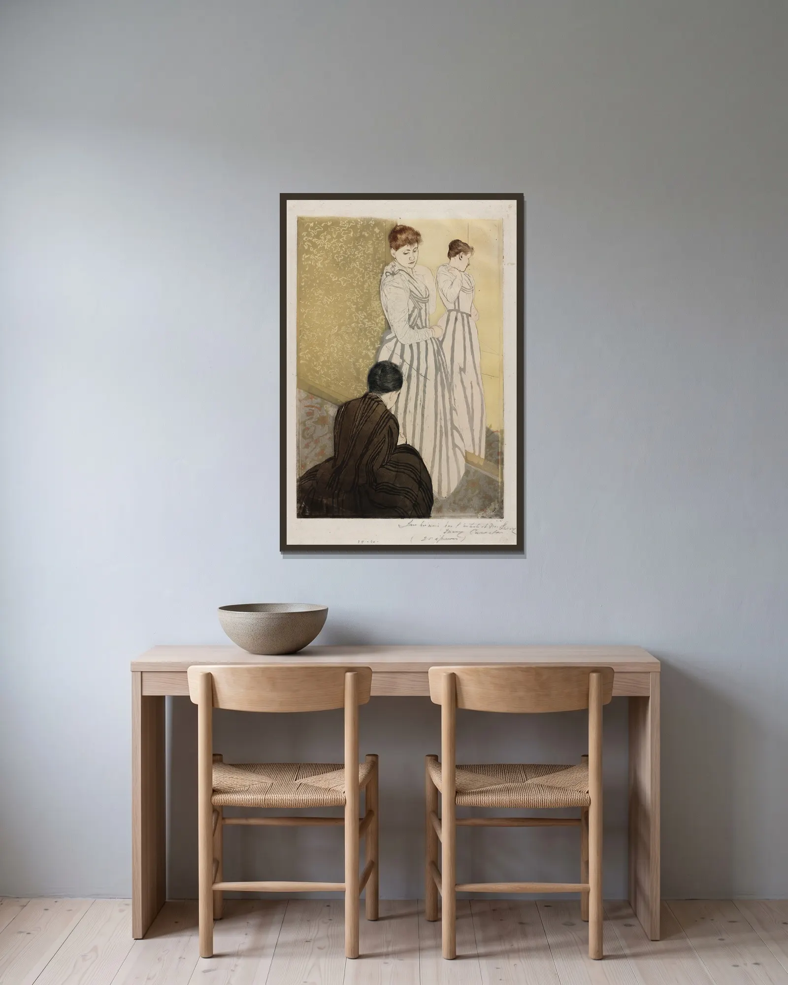 The Fitting av Mary Cassatt inramad på en vägg