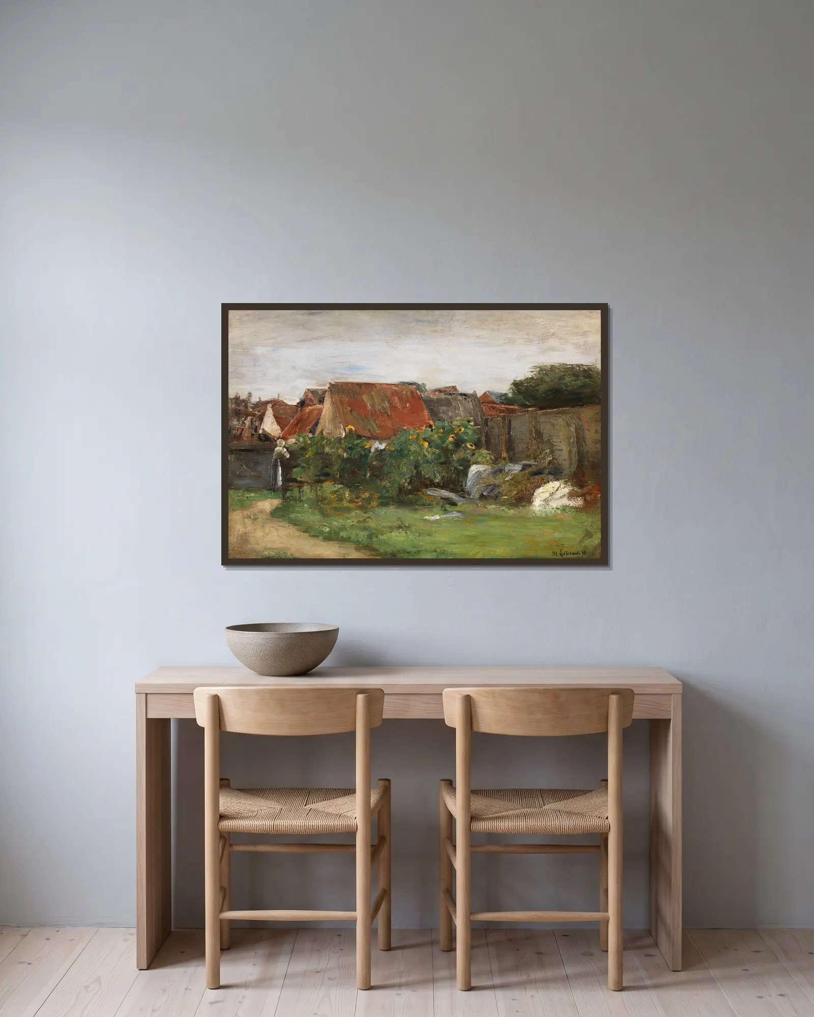 Dorfhäuser mit Sonnenblumen av Max Liebermann inramad på en vägg