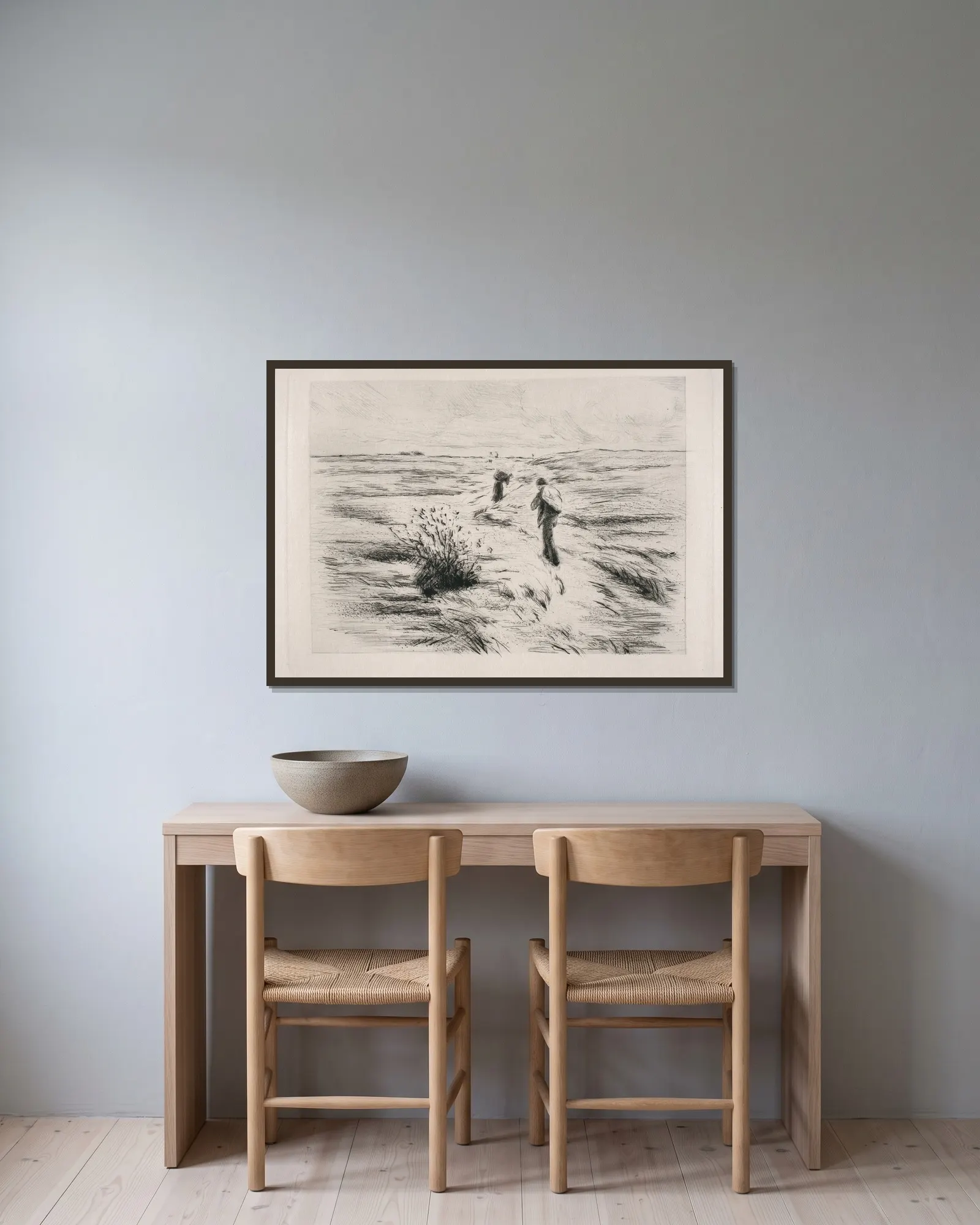 In den Dünen av Max Liebermann inramad på en vägg