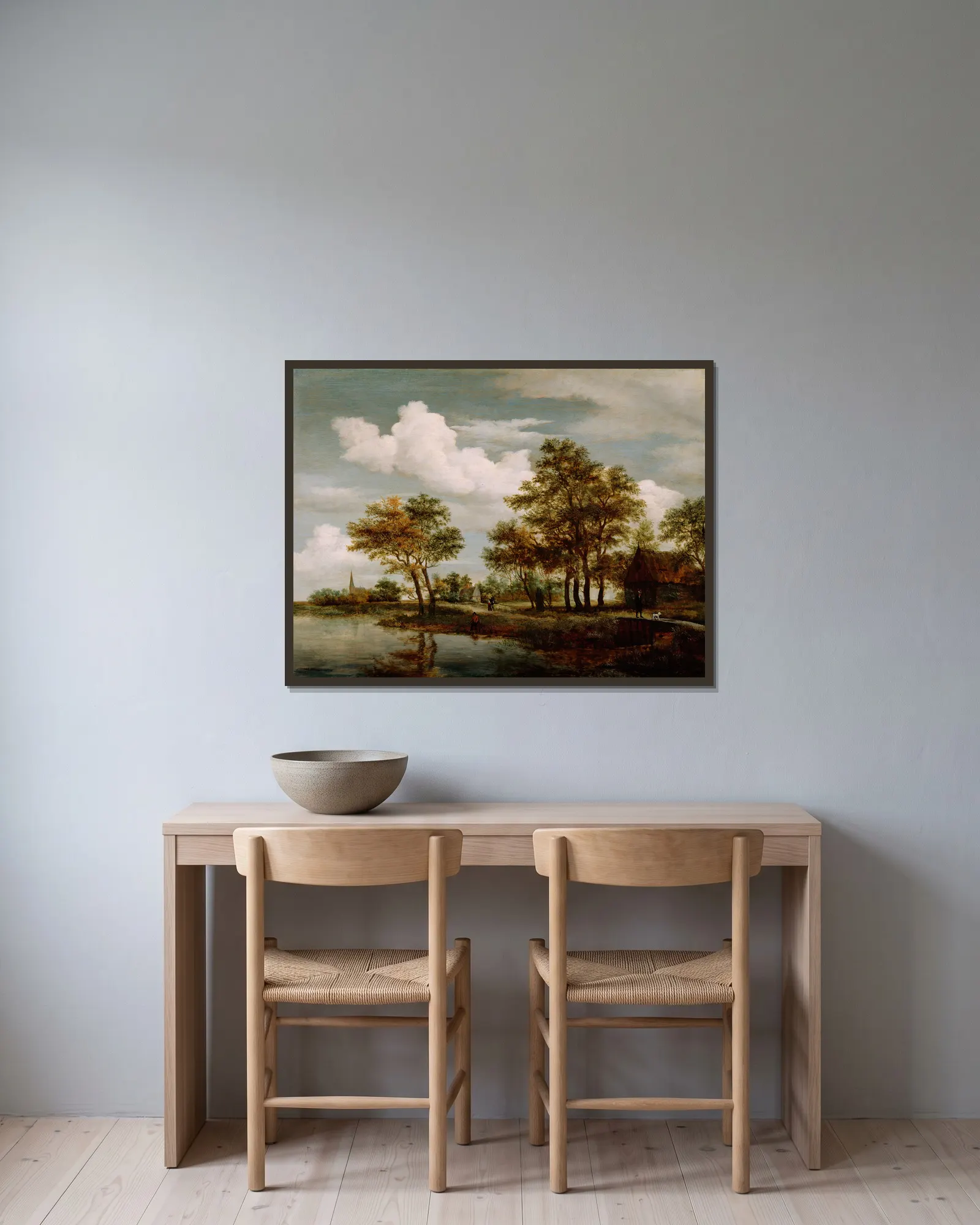 A River Scene av Meindert Hobbema inramad på en vägg