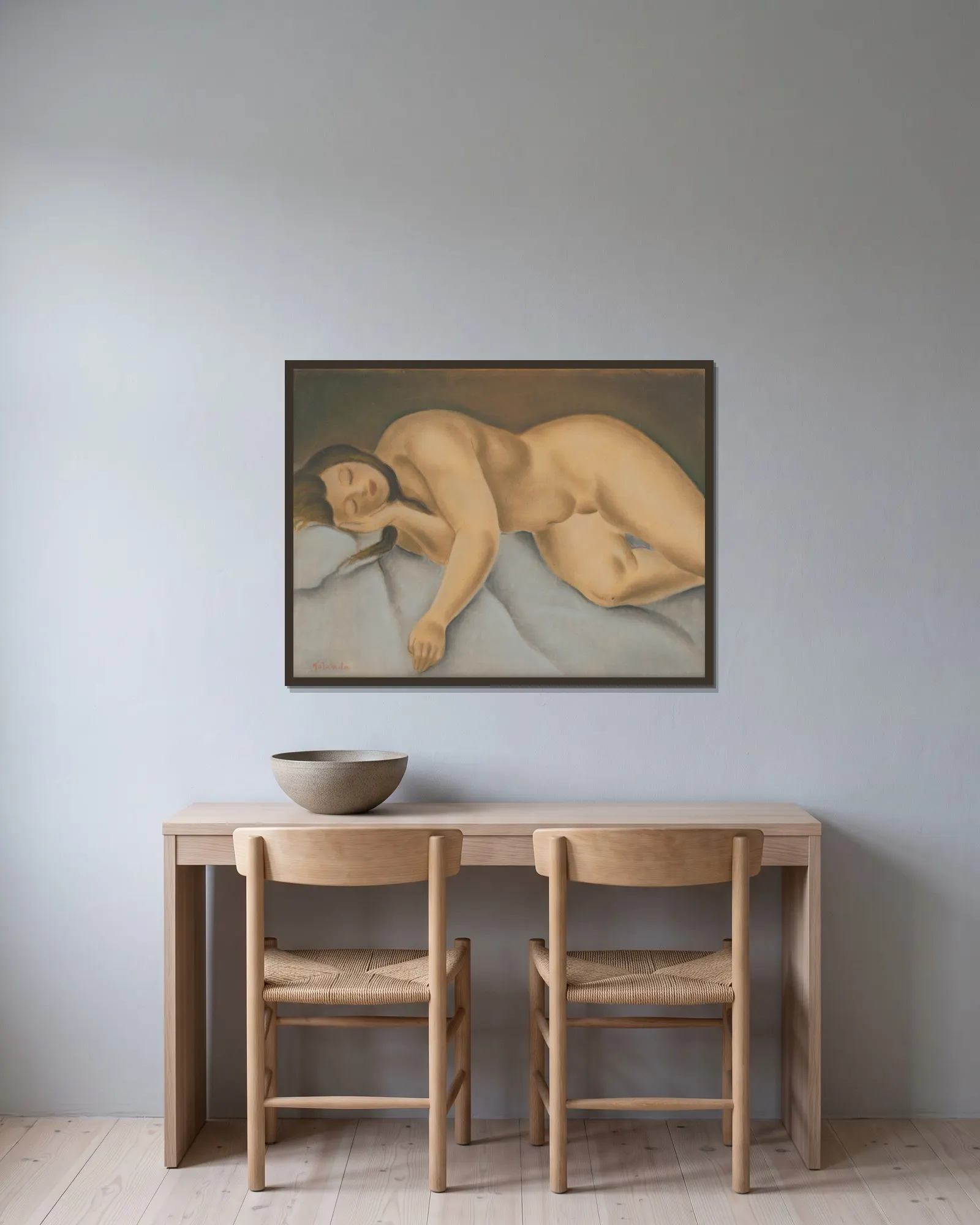 Lying female nude av Mikuláš Galanda inramad på en vägg
