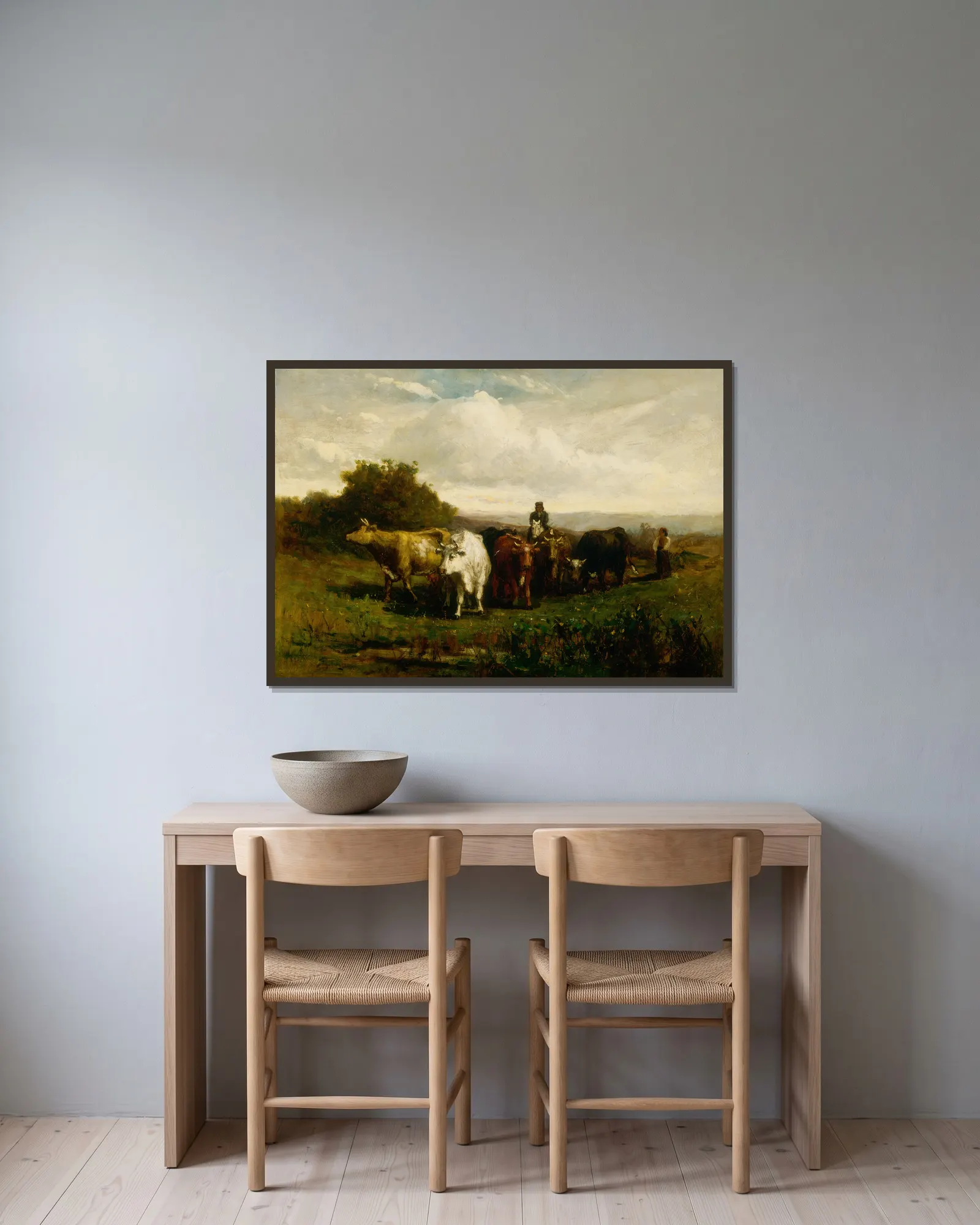 Untitled (man on horseback, woman on foot driving cattle) av Edward Mitchell Bannister inramad på en vägg